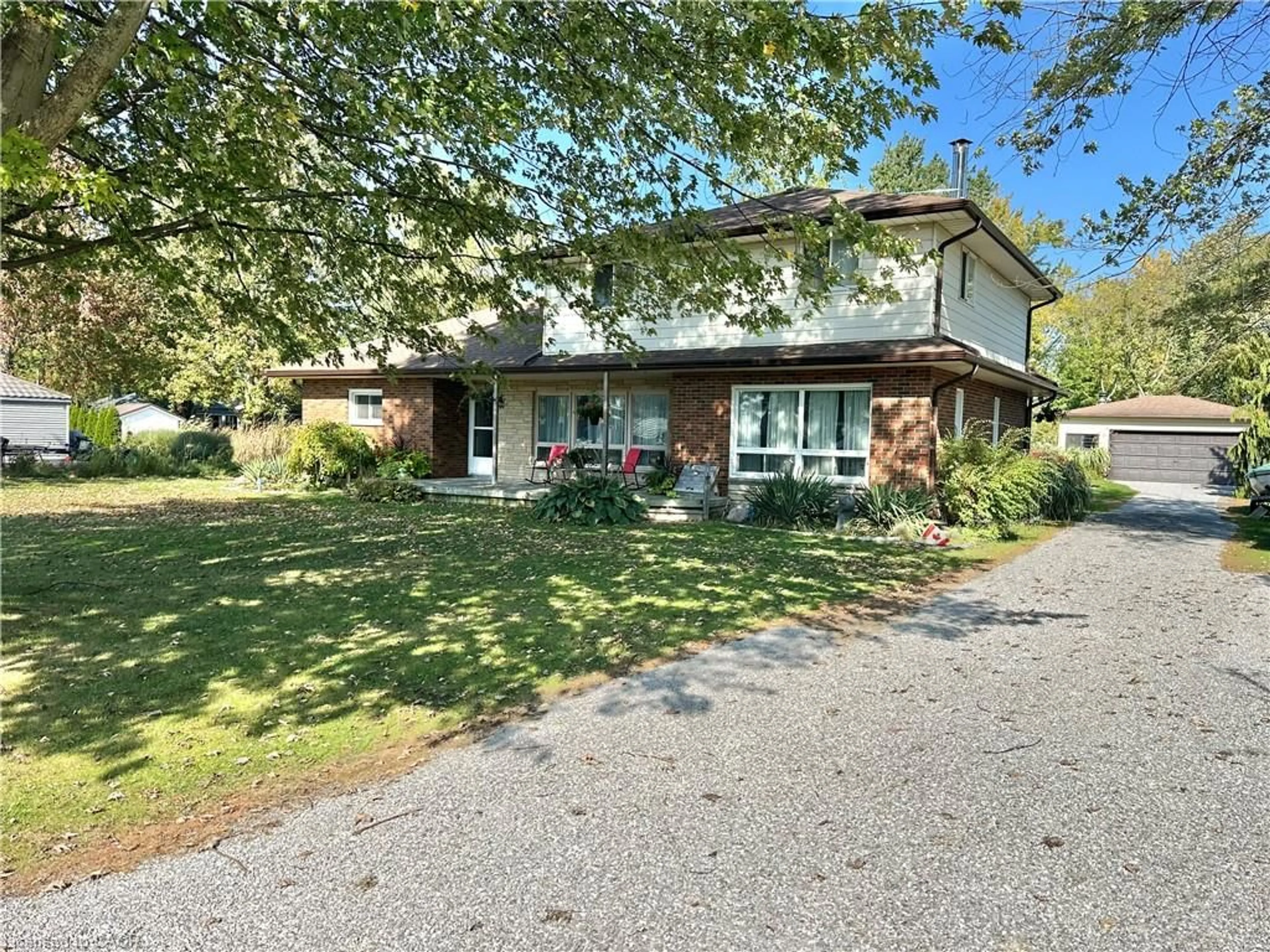 A pic from outside/outdoor area/front of a property/back of a property/a pic from drone, street for 11 Reserve St, Turkey Point Ontario N0E 1W0