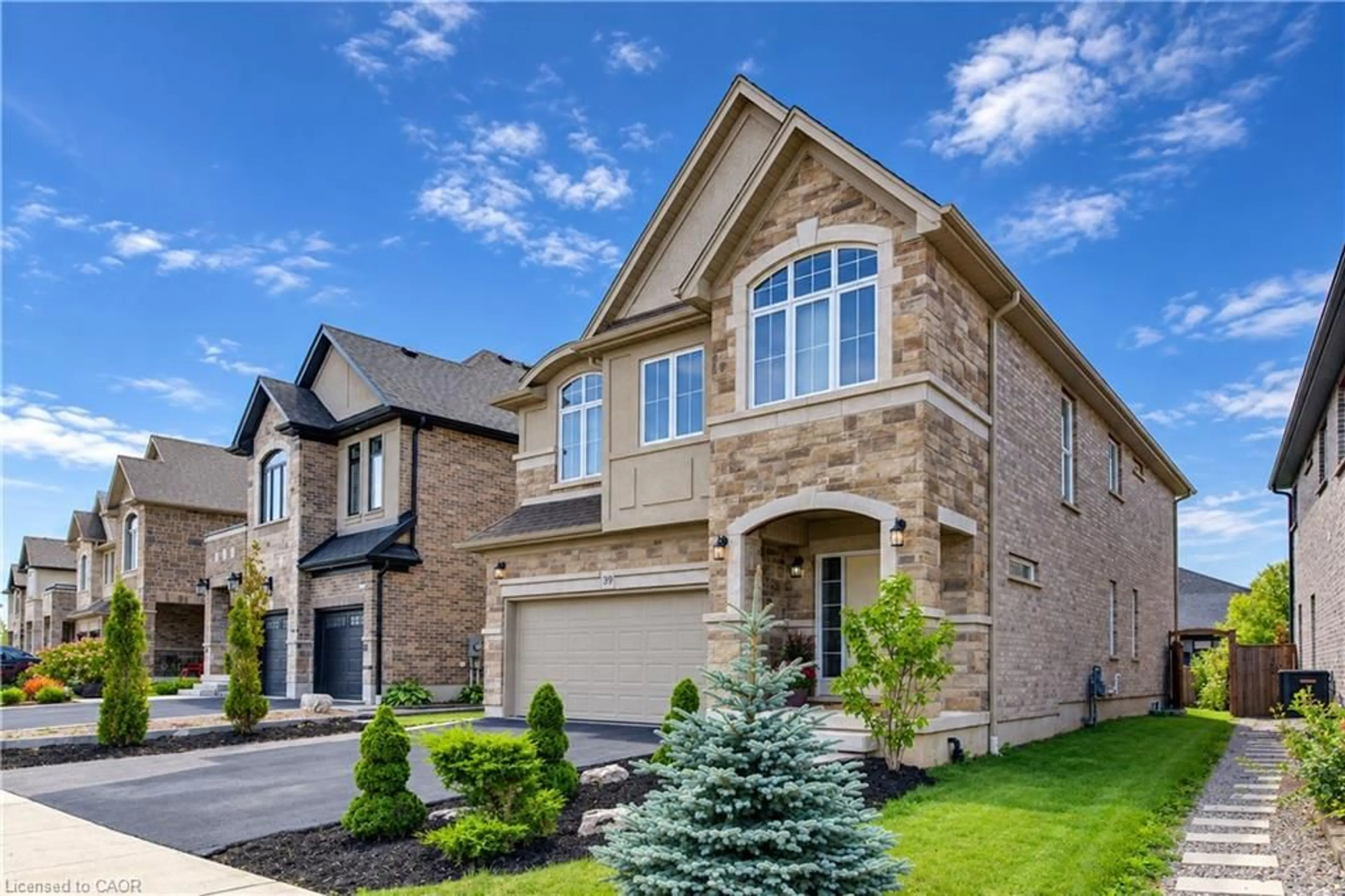 Home with brick exterior material, street for 519 Gristmill St, Waterloo Ontario N2K 0C9