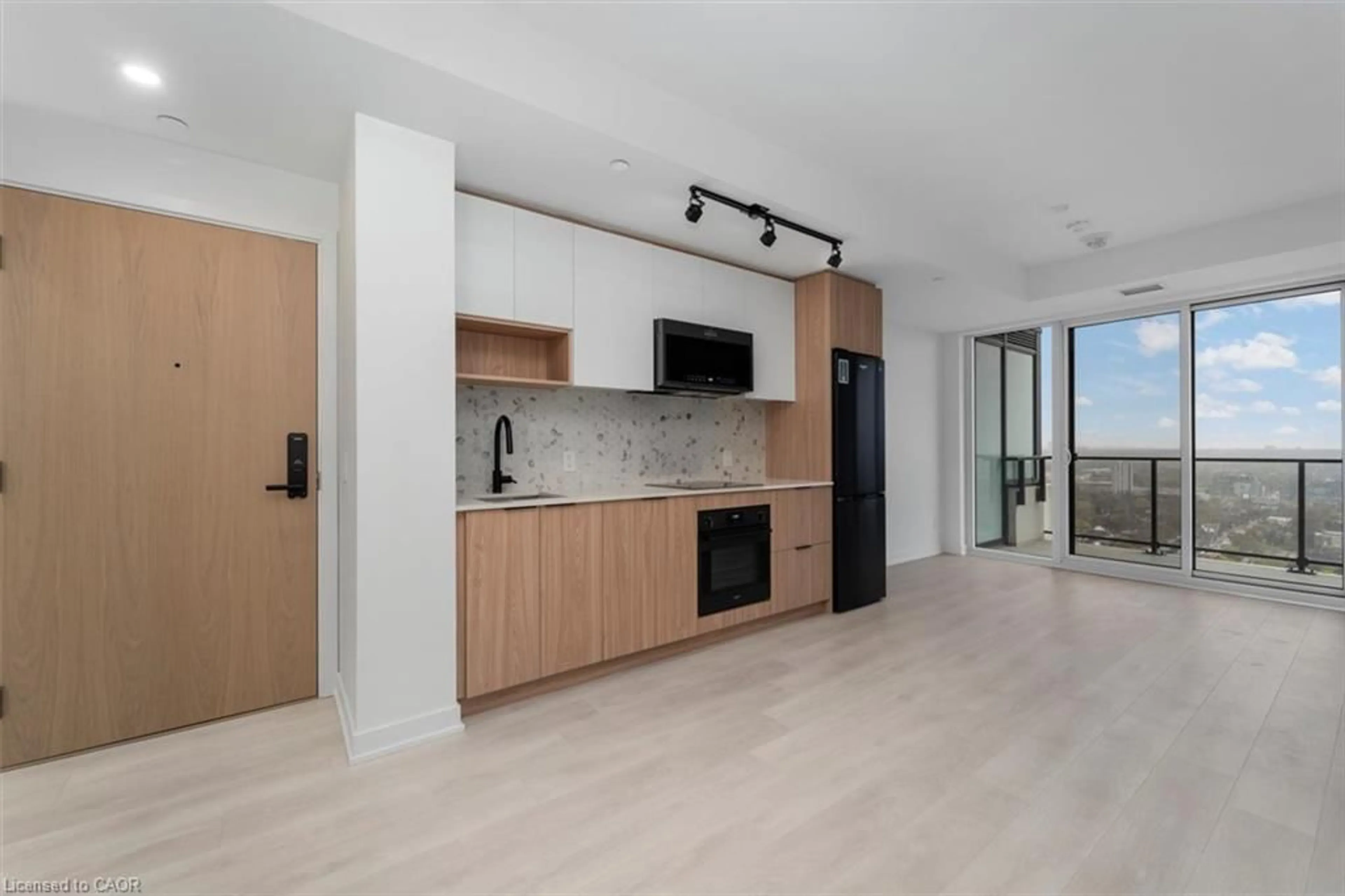 Open concept kitchen, wood/laminate floor for 5 Defries St #2713, Toronto Ontario M5A 0W7