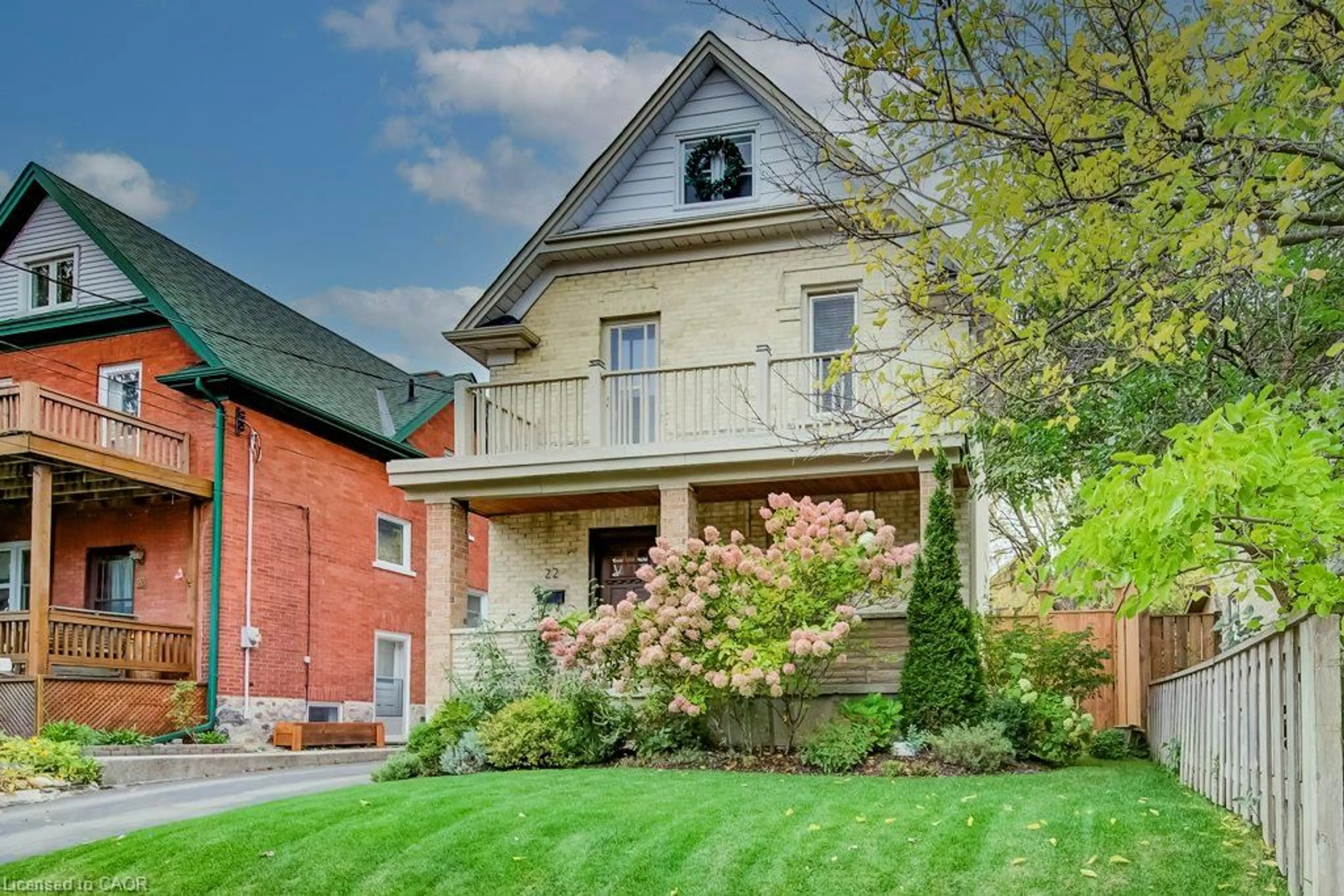 Home with brick exterior material, street for 22 Whitney Pl, Kitchener Ontario N2G 2X5