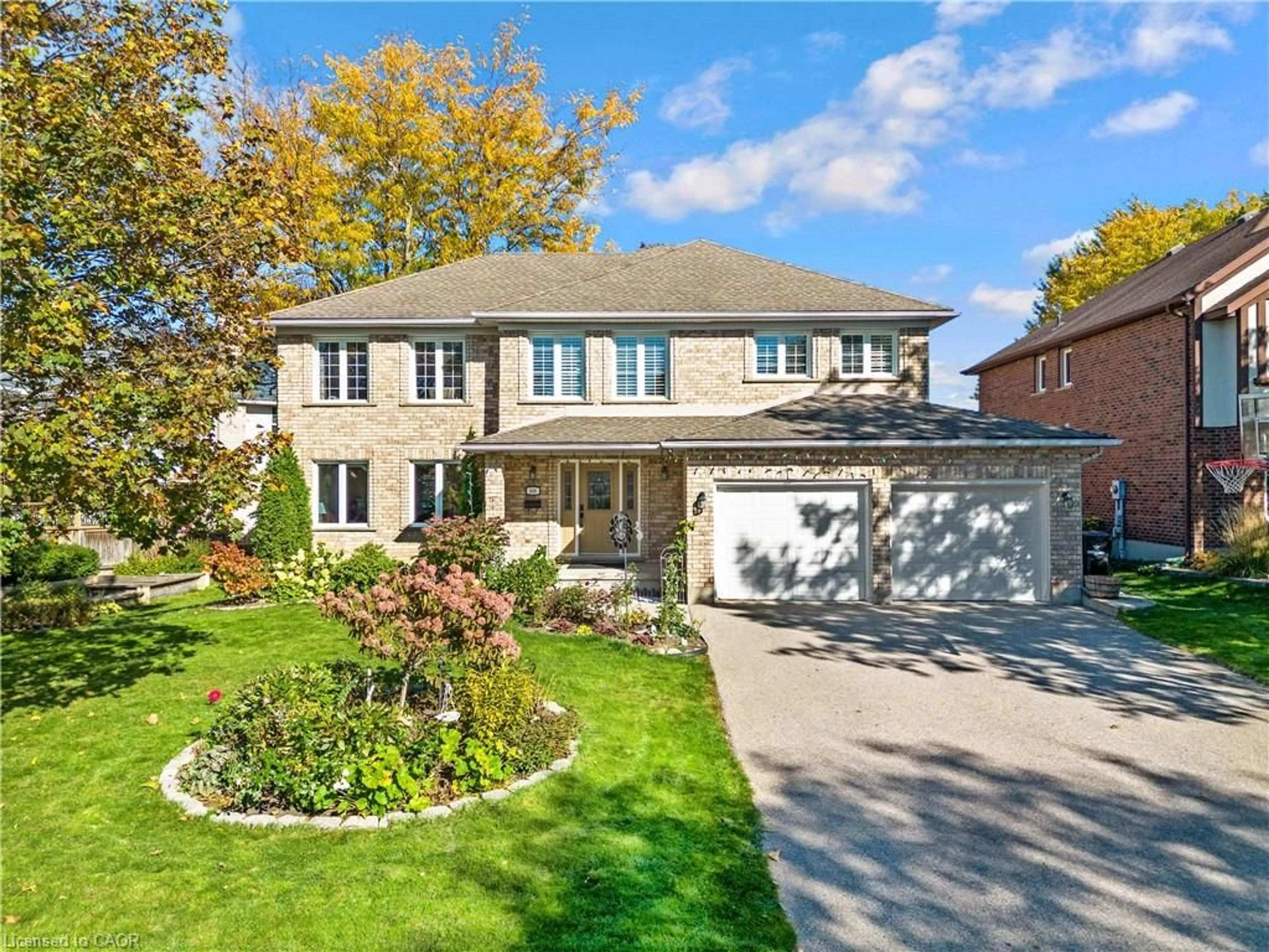 Home with brick exterior material, street for 548 Sandbrooke Crt, Waterloo Ontario N2T 2H4