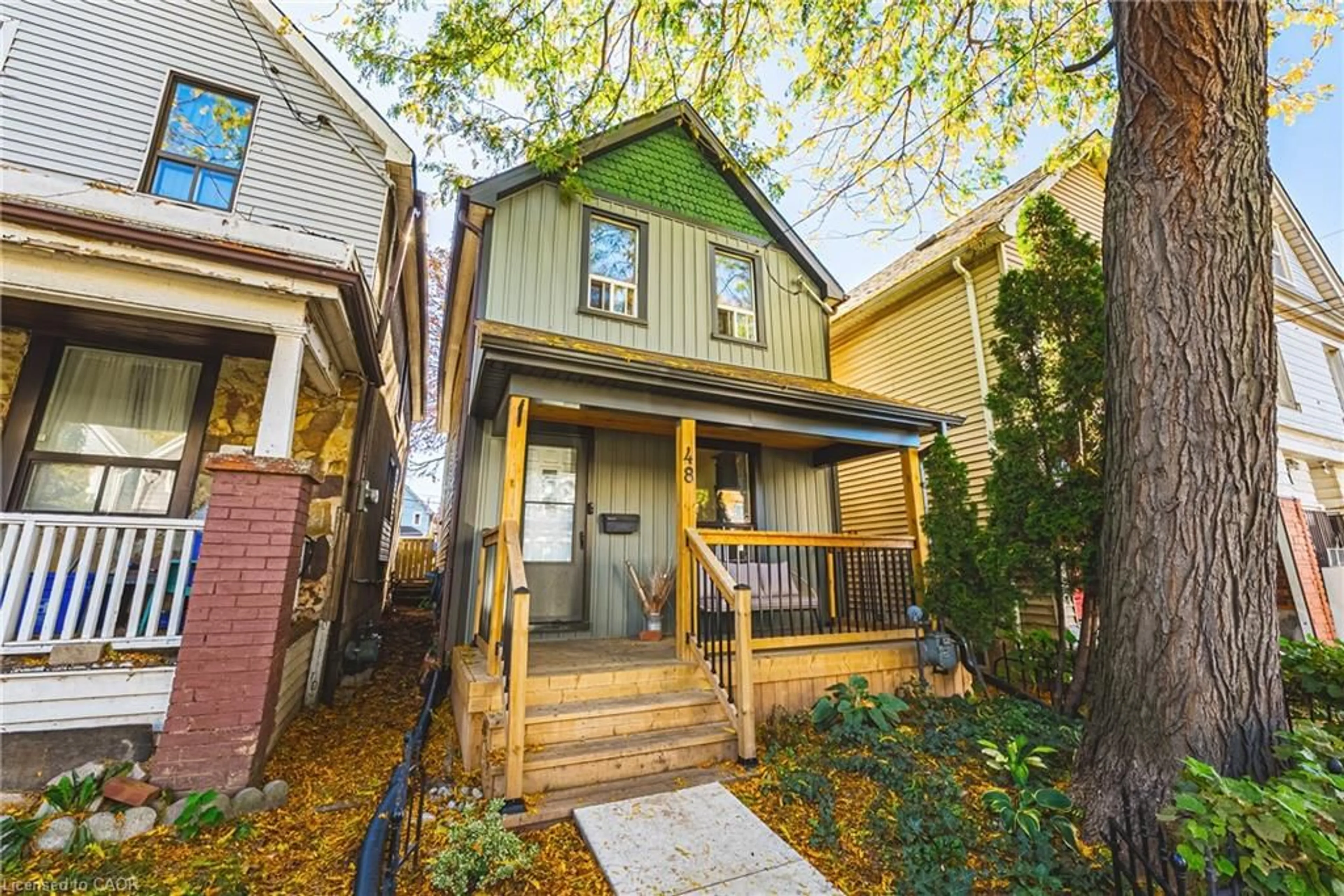 Home with vinyl exterior material, street for 48 Francis St, Hamilton Ontario L8L 3V3
