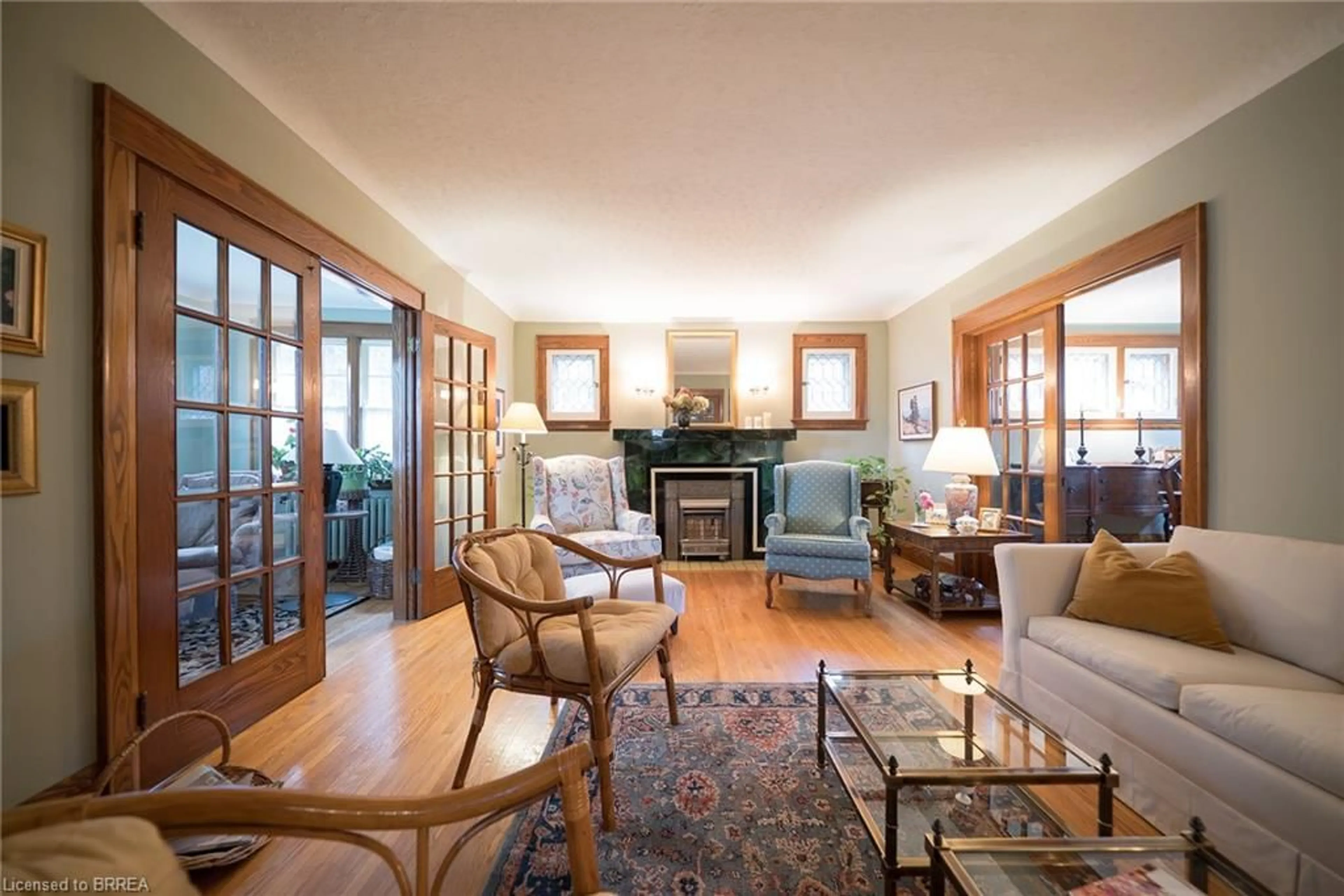 Living room with furniture, wood/laminate floor for 354 West St, Simcoe Ontario N3Y 1T5