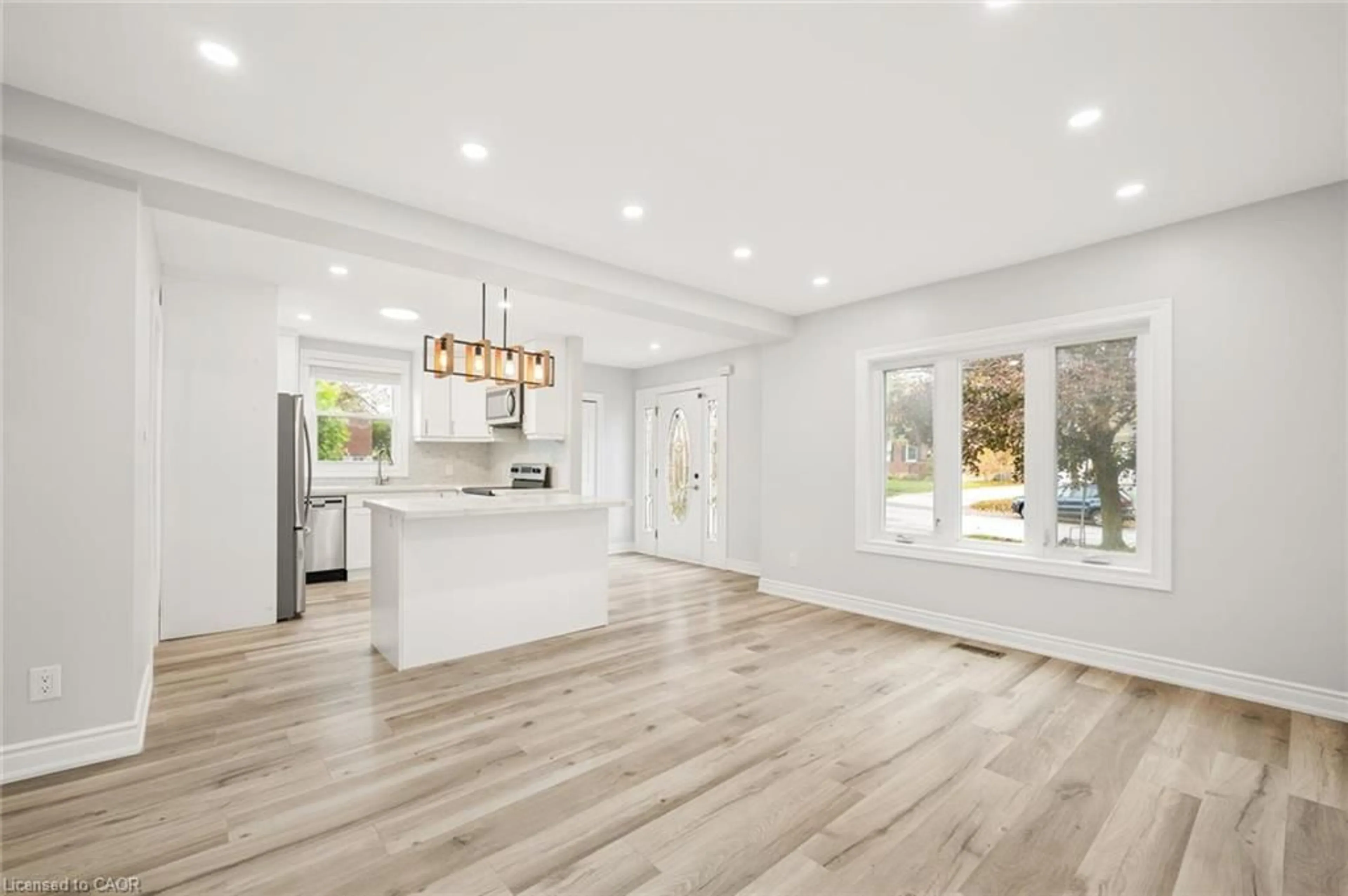 Open concept kitchen, wood/laminate floor for 91 Jackson Ave, Kitchener Ontario N2H 3P2