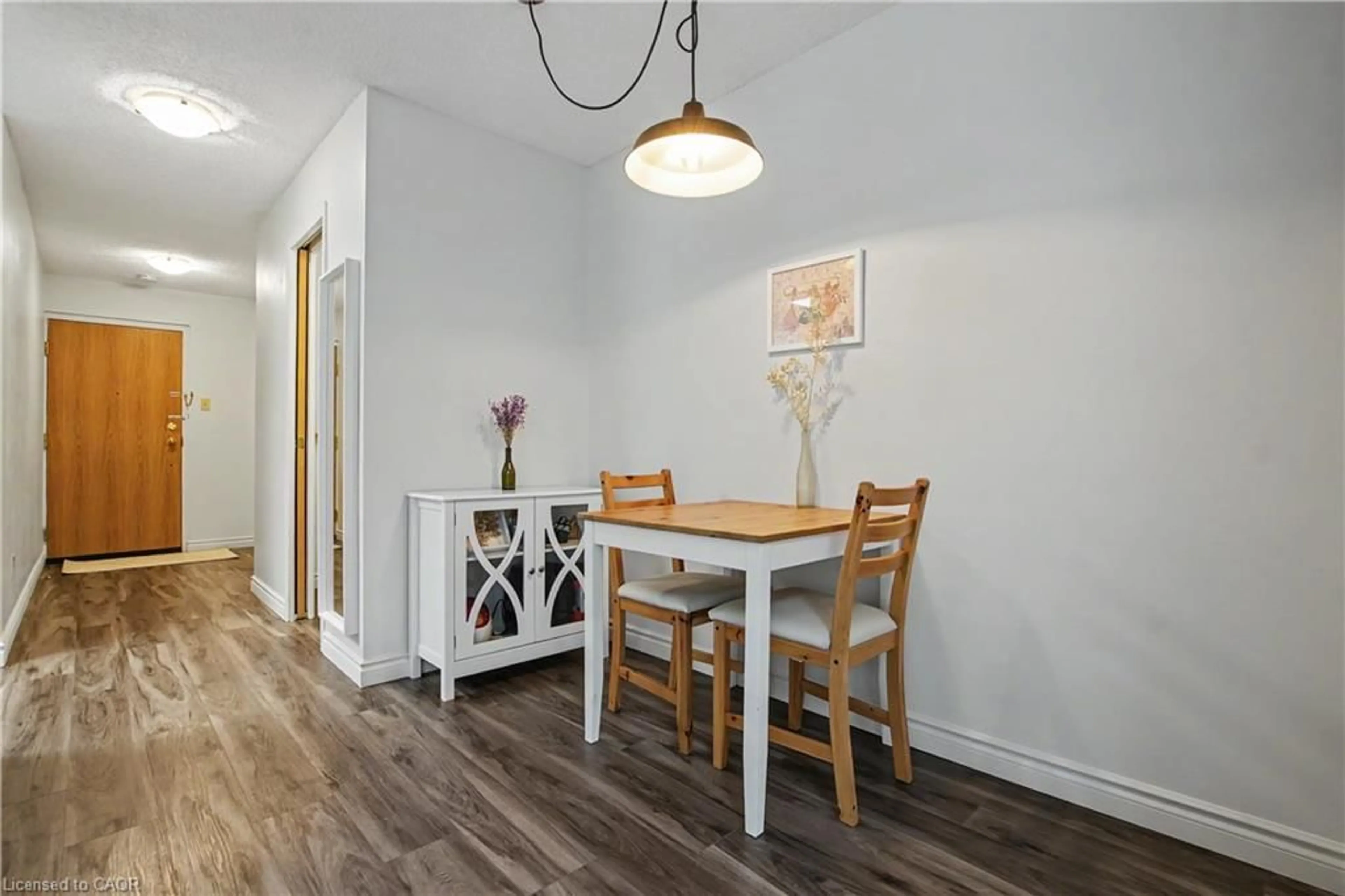 Dining room, wood/laminate floor for 20 Ellen St #207, Kitchener Ontario N2H 6R7