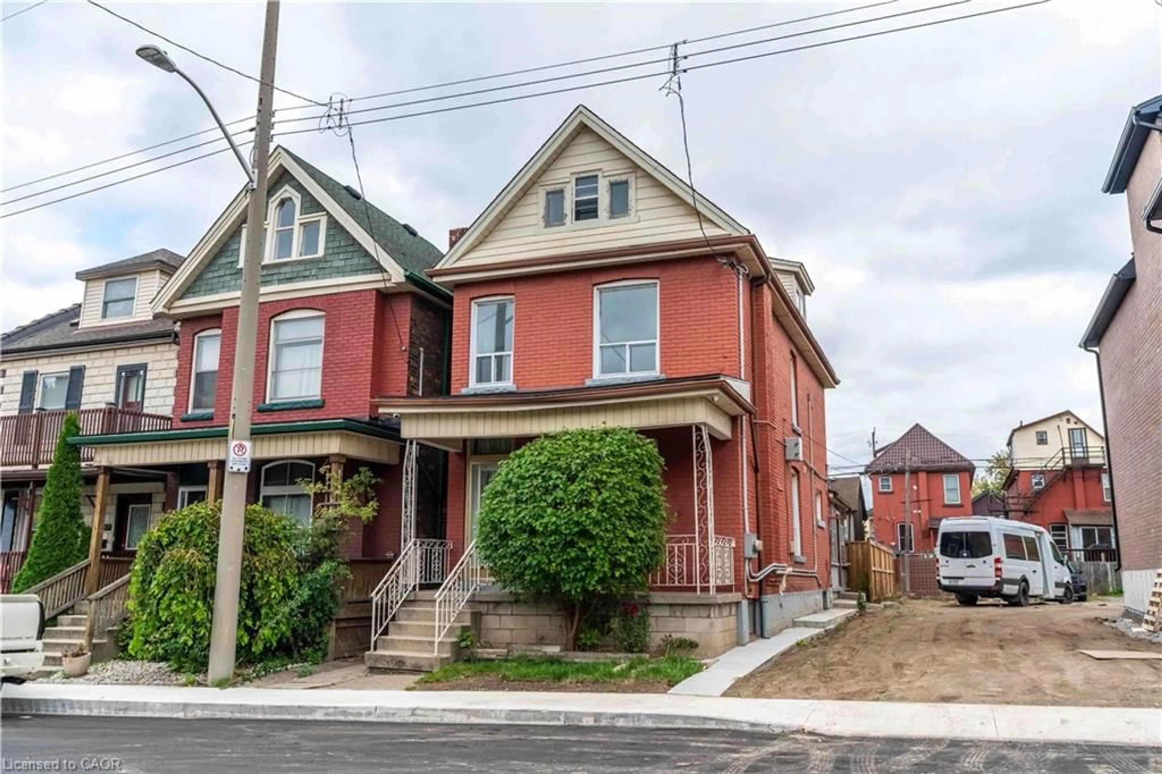 Home with brick exterior material, street for 58 St. Matthews Ave, Hamilton Ontario L8L 5P3
