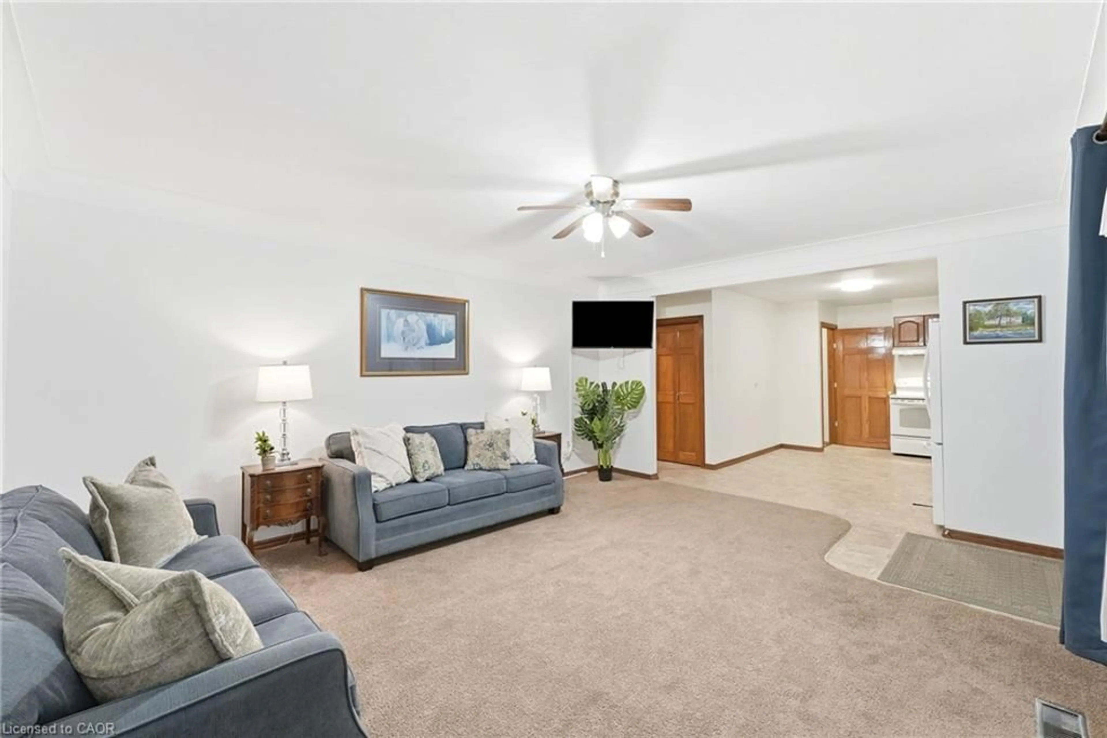 Living room with furniture, carpet floor for 7 Edward St, Milverton Ontario N0K 1M0