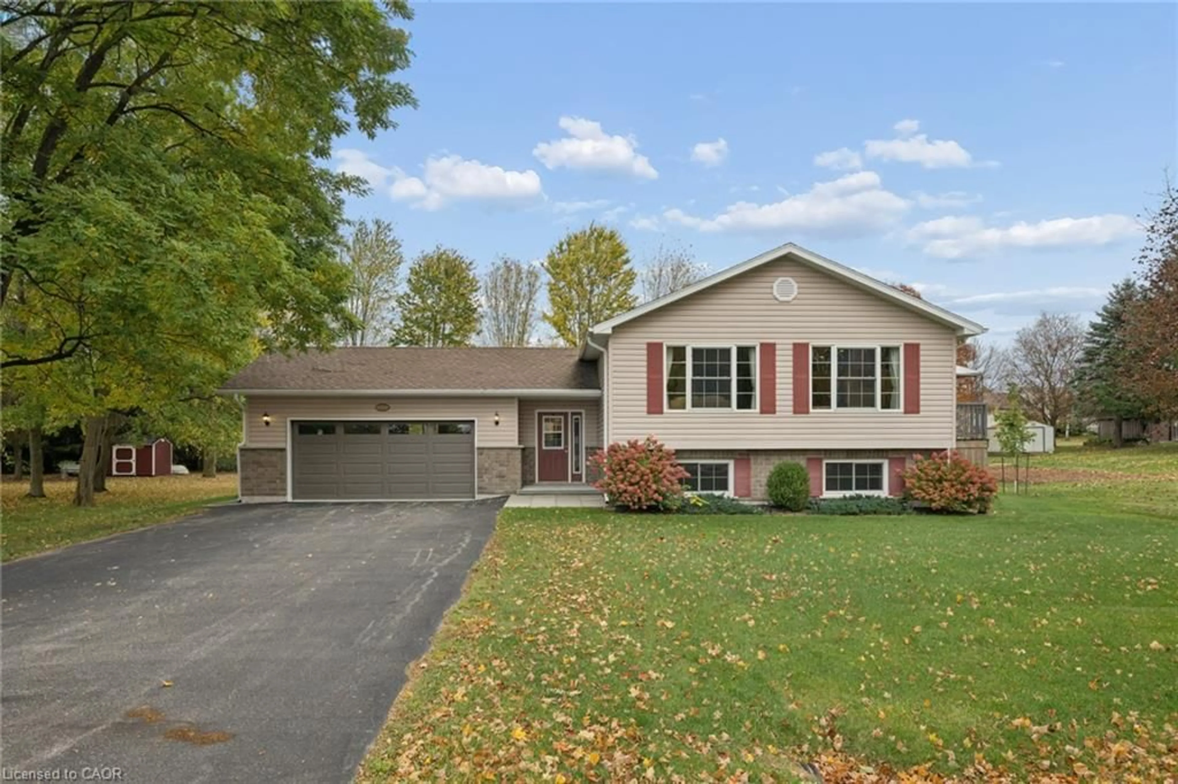 Home with vinyl exterior material, street for 1120 Centre St, Wroxeter Ontario N0G 2X0