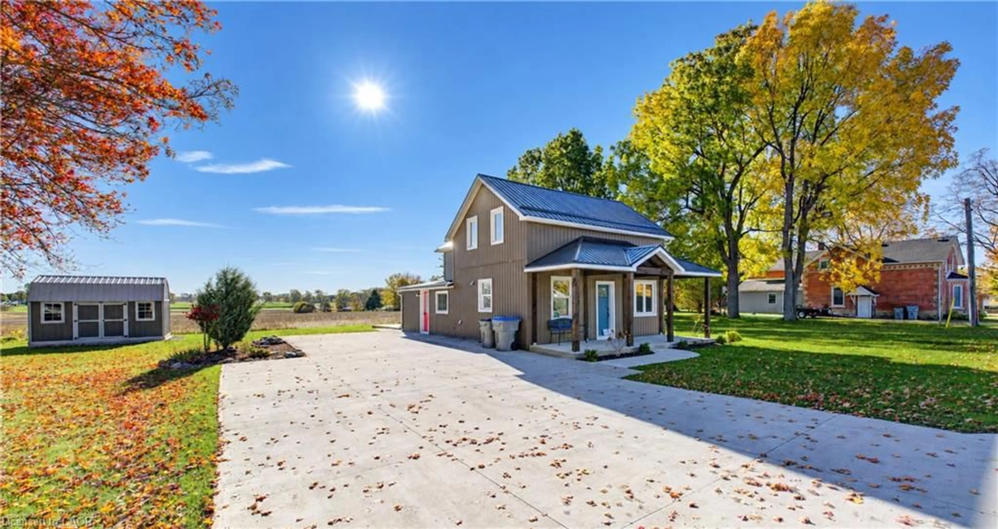 A pic from outside/outdoor area/front of a property/back of a property/a pic from drone, street for 8111 Rd 177, Listowel Ontario N4W 3G6