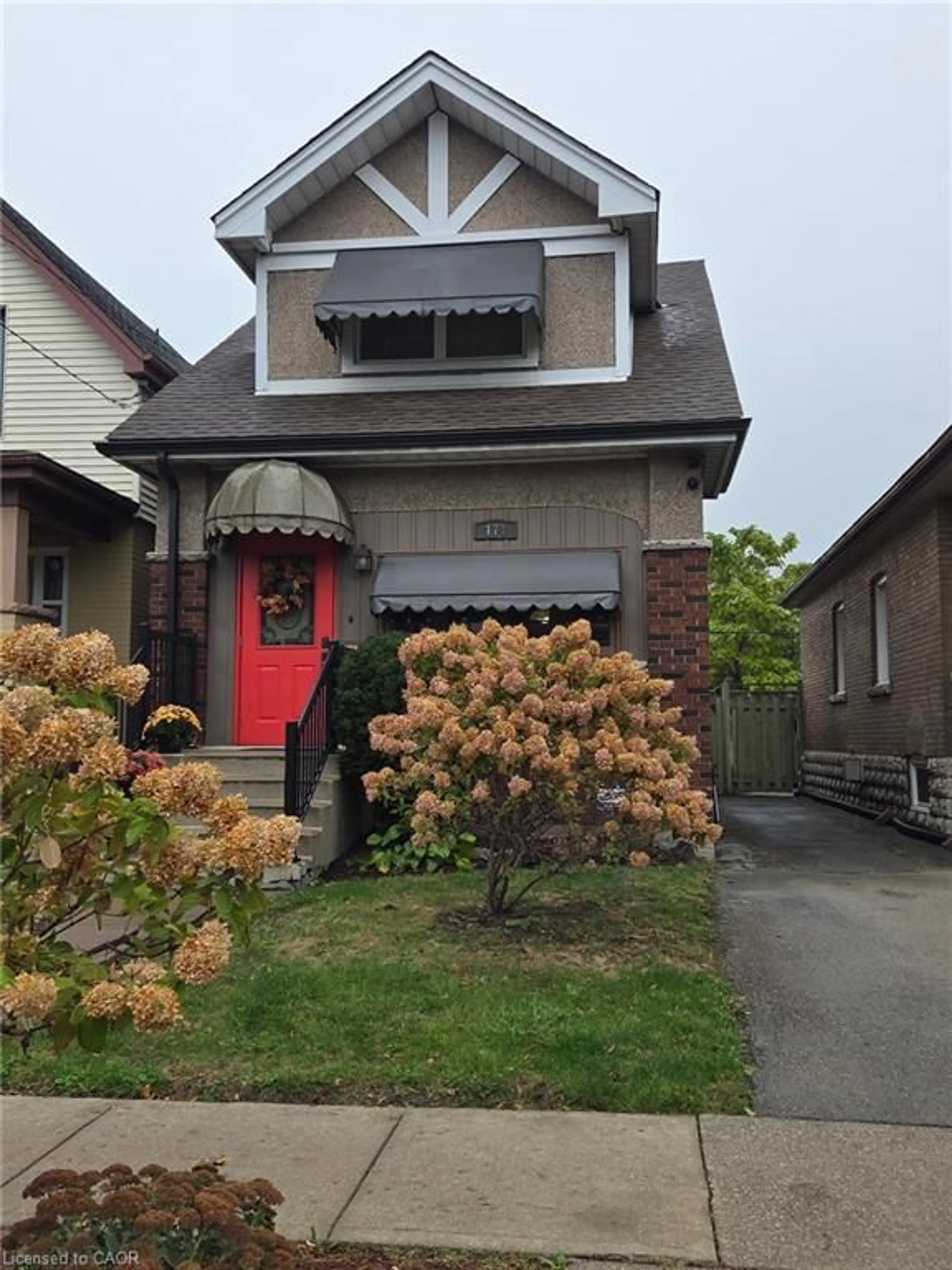 Home with brick exterior material, street for 178 Tragina Ave, Hamilton Ontario L8H 5C8