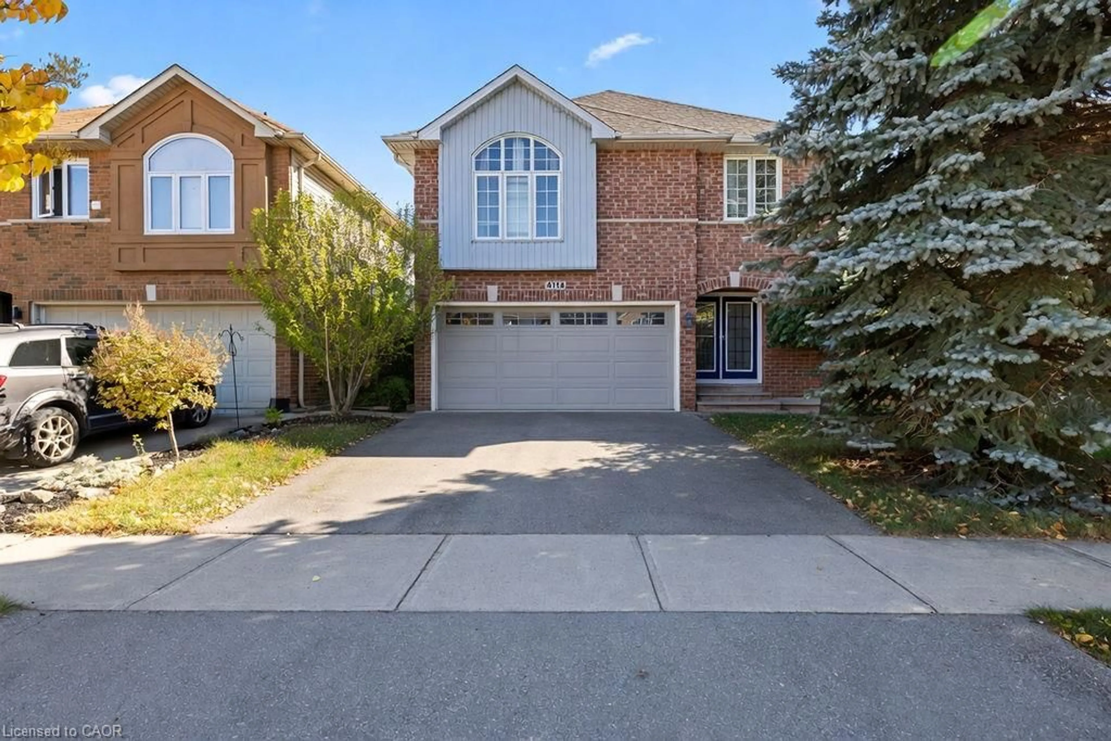 Home with brick exterior material, street for 4114 Pincay Oaks Lane, Burlington Ontario L7M 4L6
