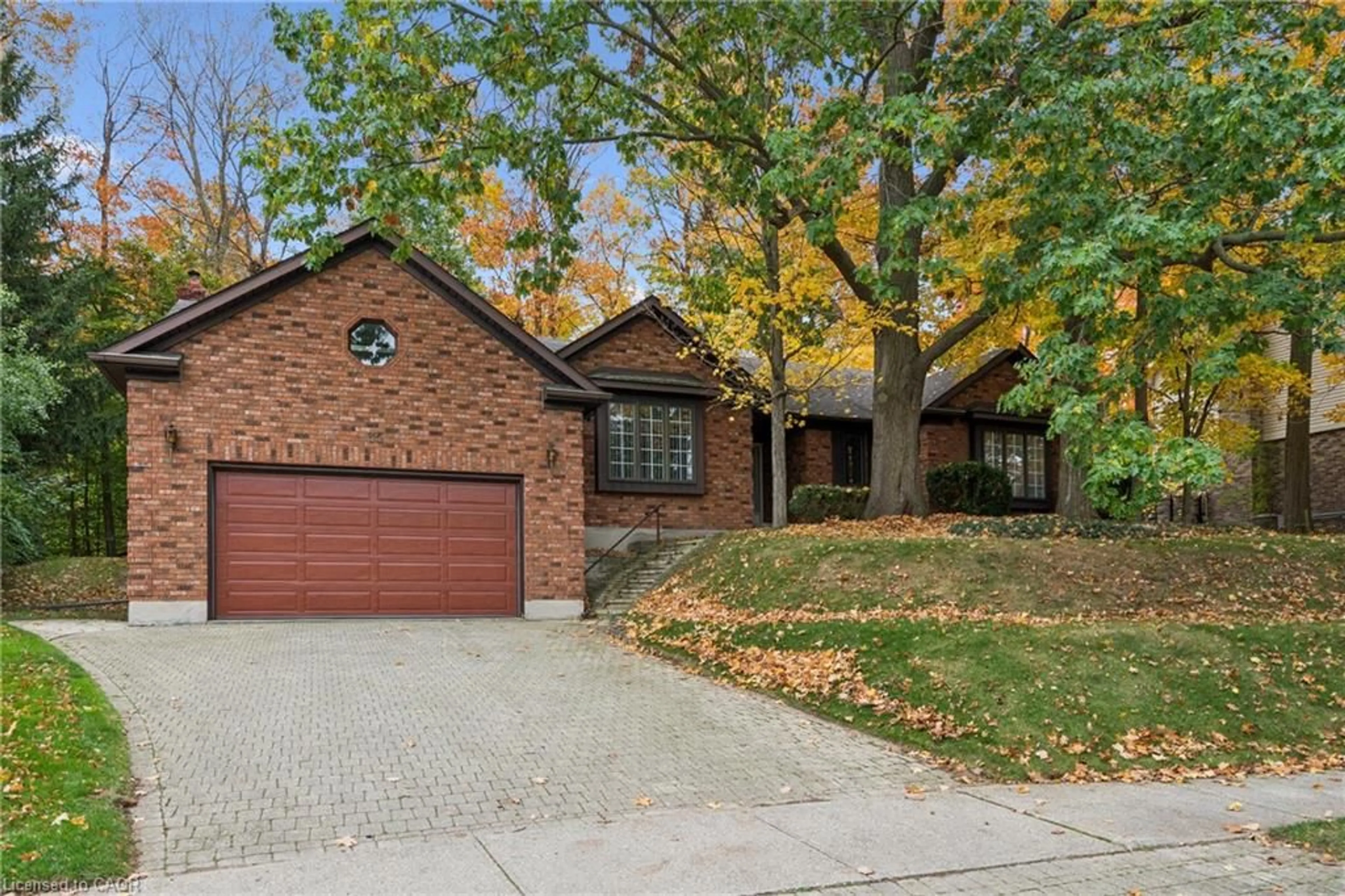 Home with brick exterior material, street for 35 Huntingdale Dr, Kitchener Ontario N2A 3K5