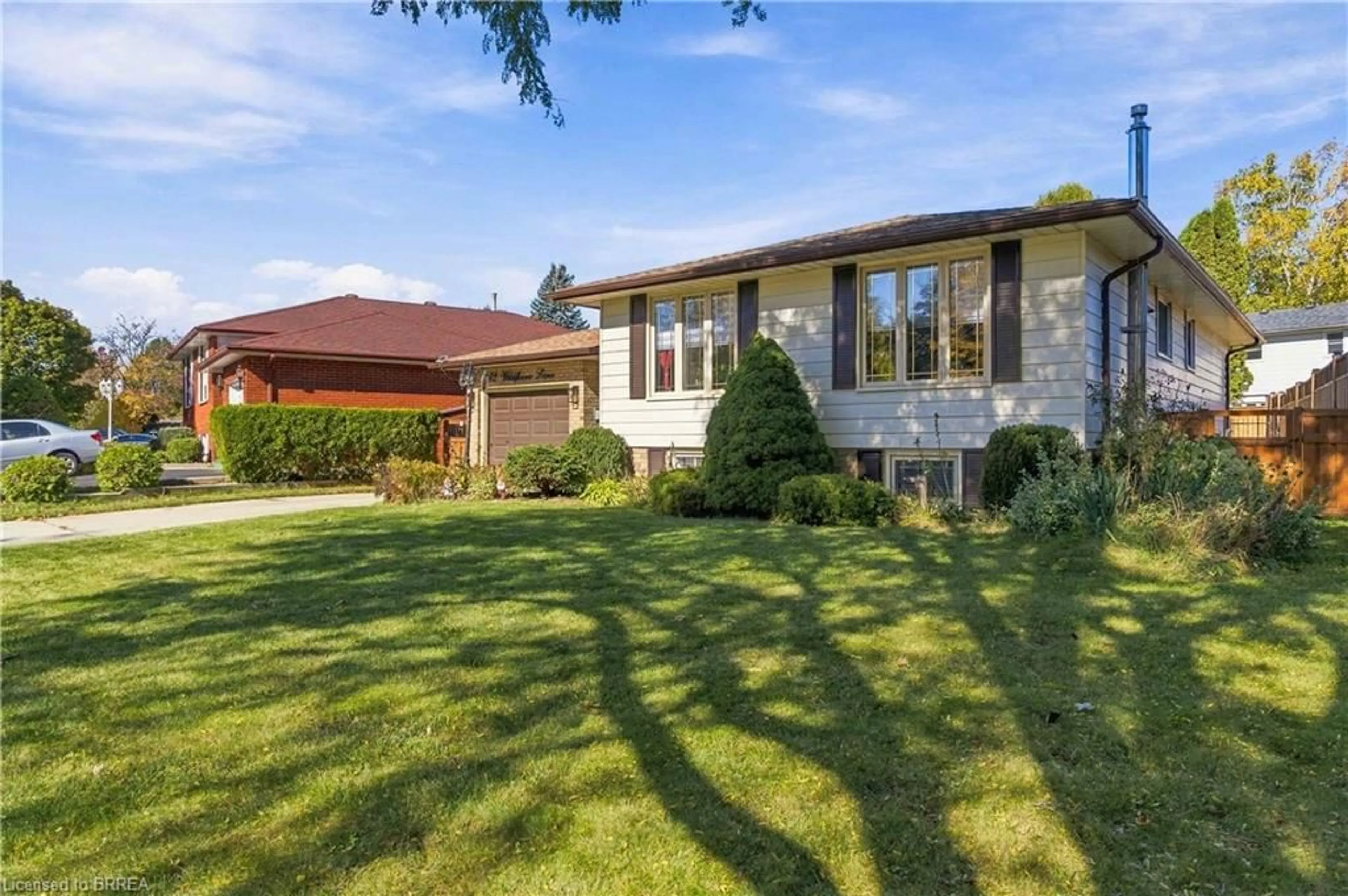 Home with brick exterior material, unknown for 42 Wildflower Lane, Brantford Ontario N3R 7H6