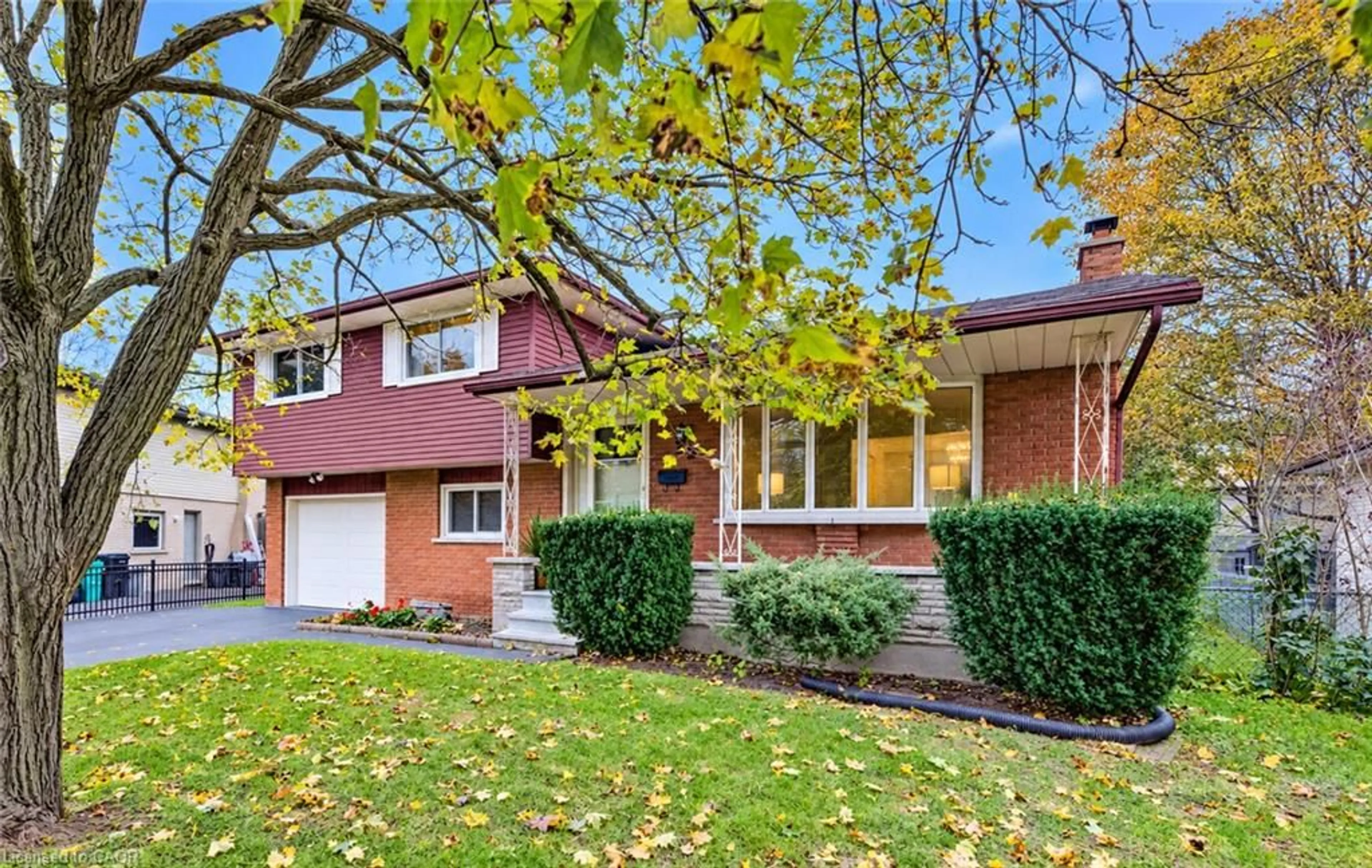 Home with brick exterior material, street for 30 Hampton Pl, Kitchener Ontario N2B 2S3