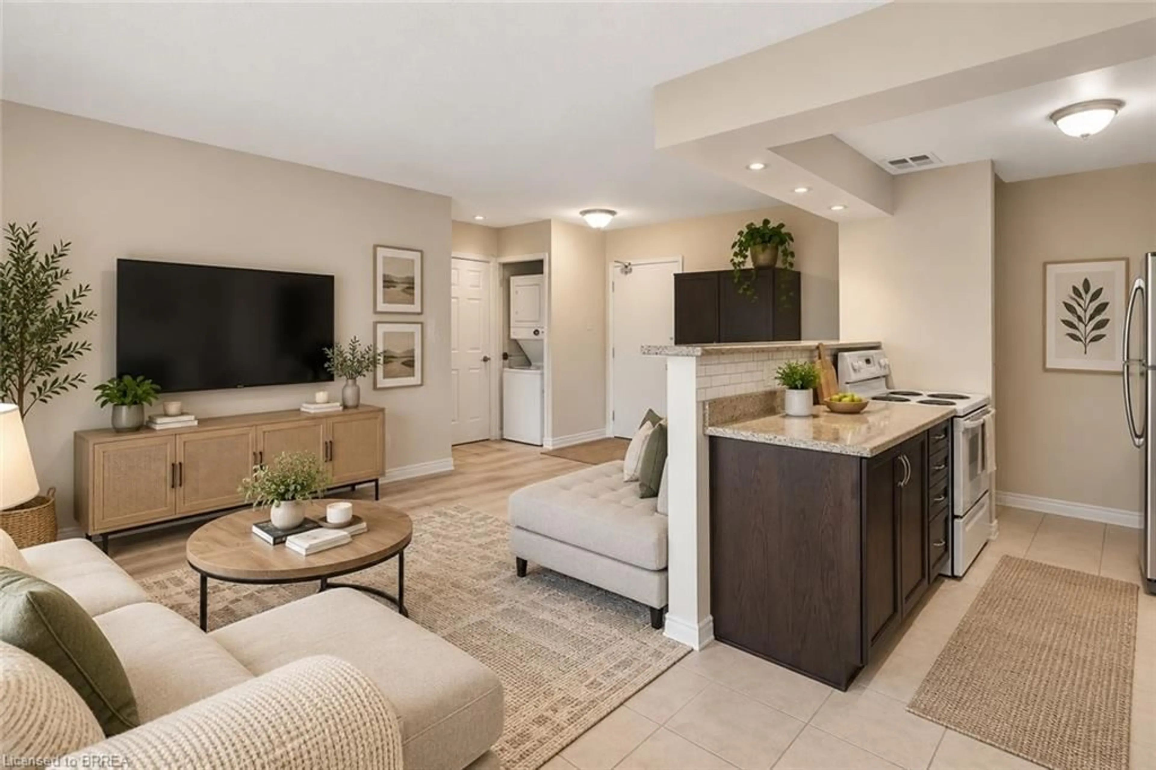 Living room with furniture, unknown for 793 Colborne St #104, Brantford Ontario N3S 7J3