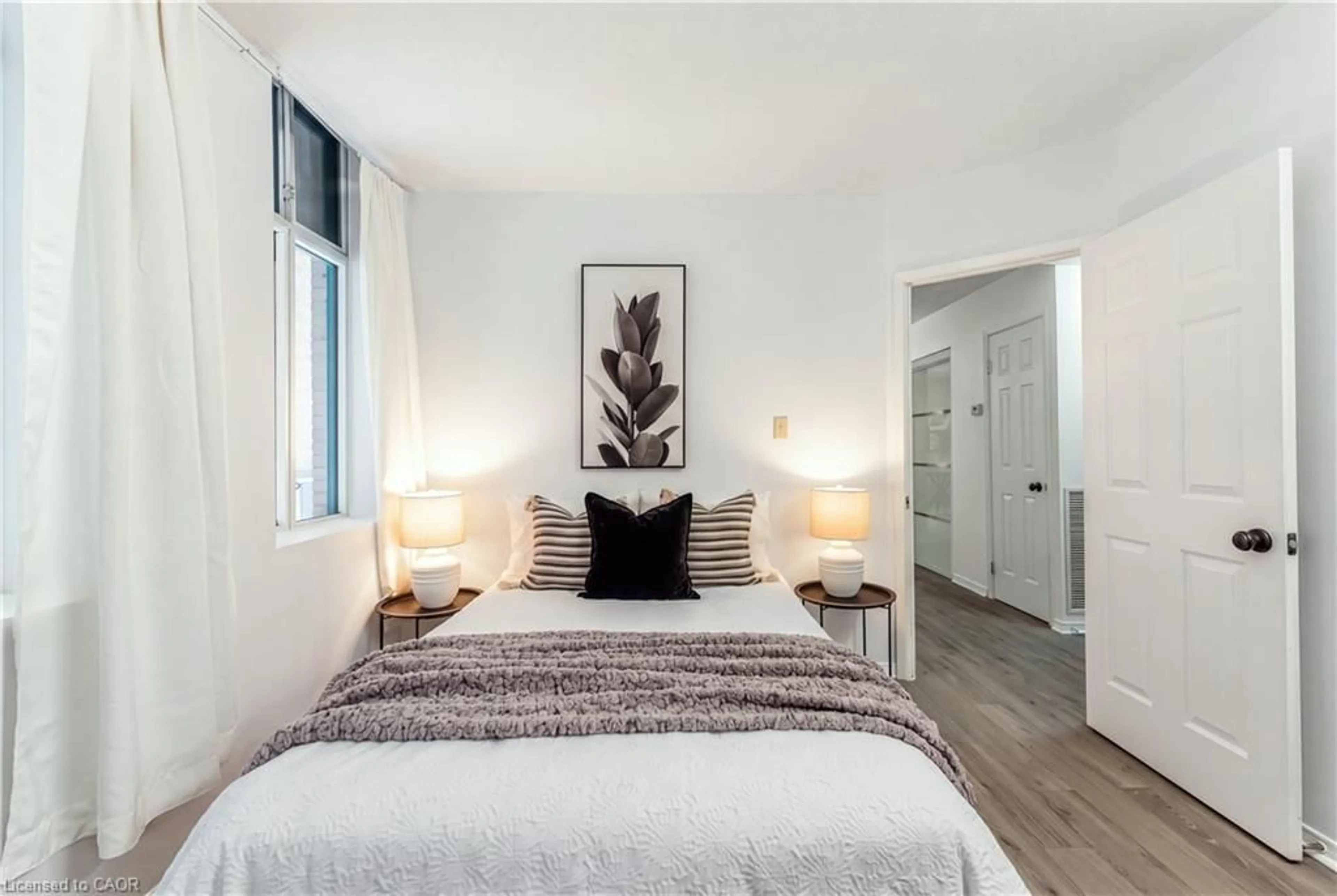 Bedroom with bed, unknown for 36 James St #303, Hamilton Ontario L8P 4W4