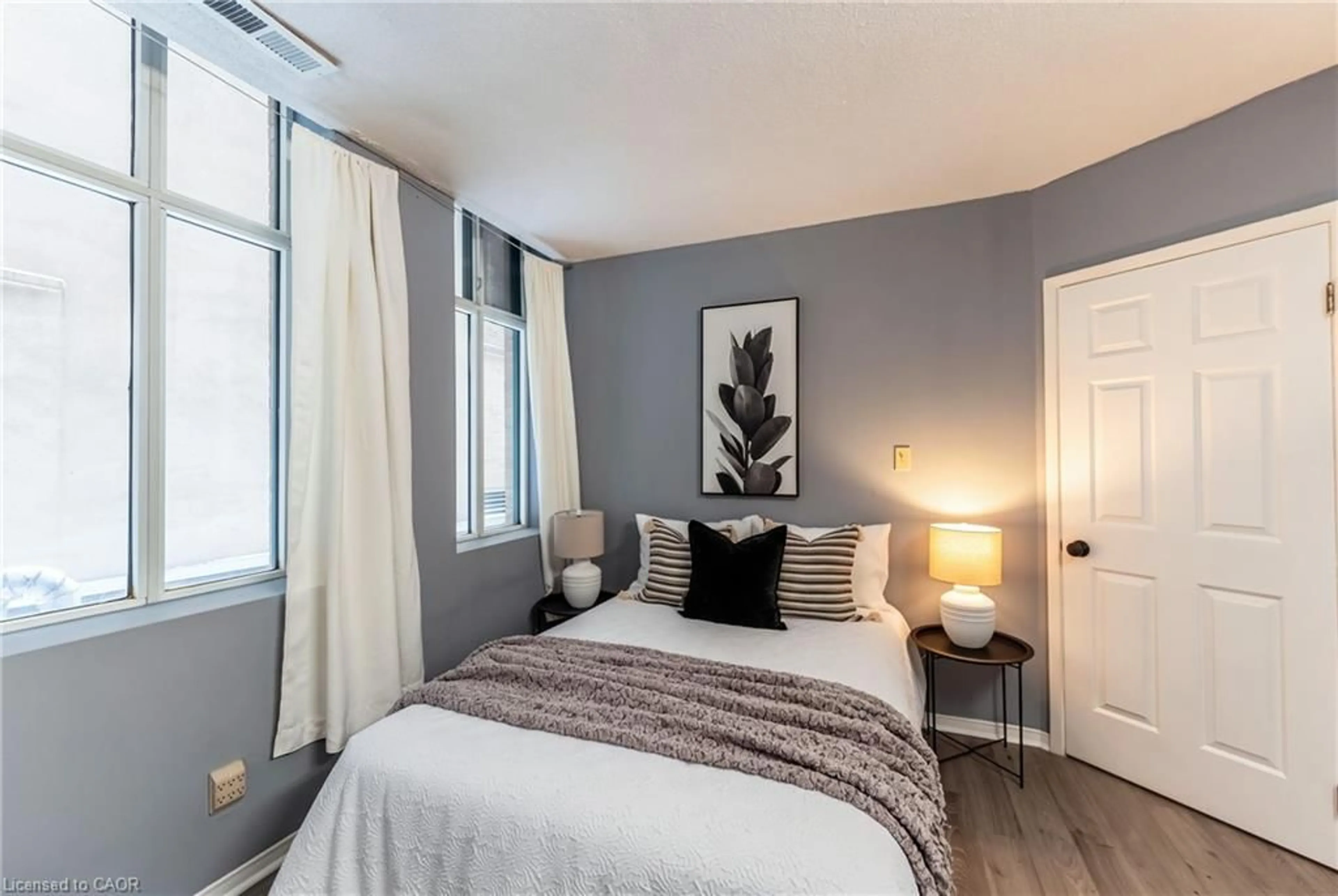 Bedroom with bed, unknown for 36 James St #303, Hamilton Ontario L8P 4W4
