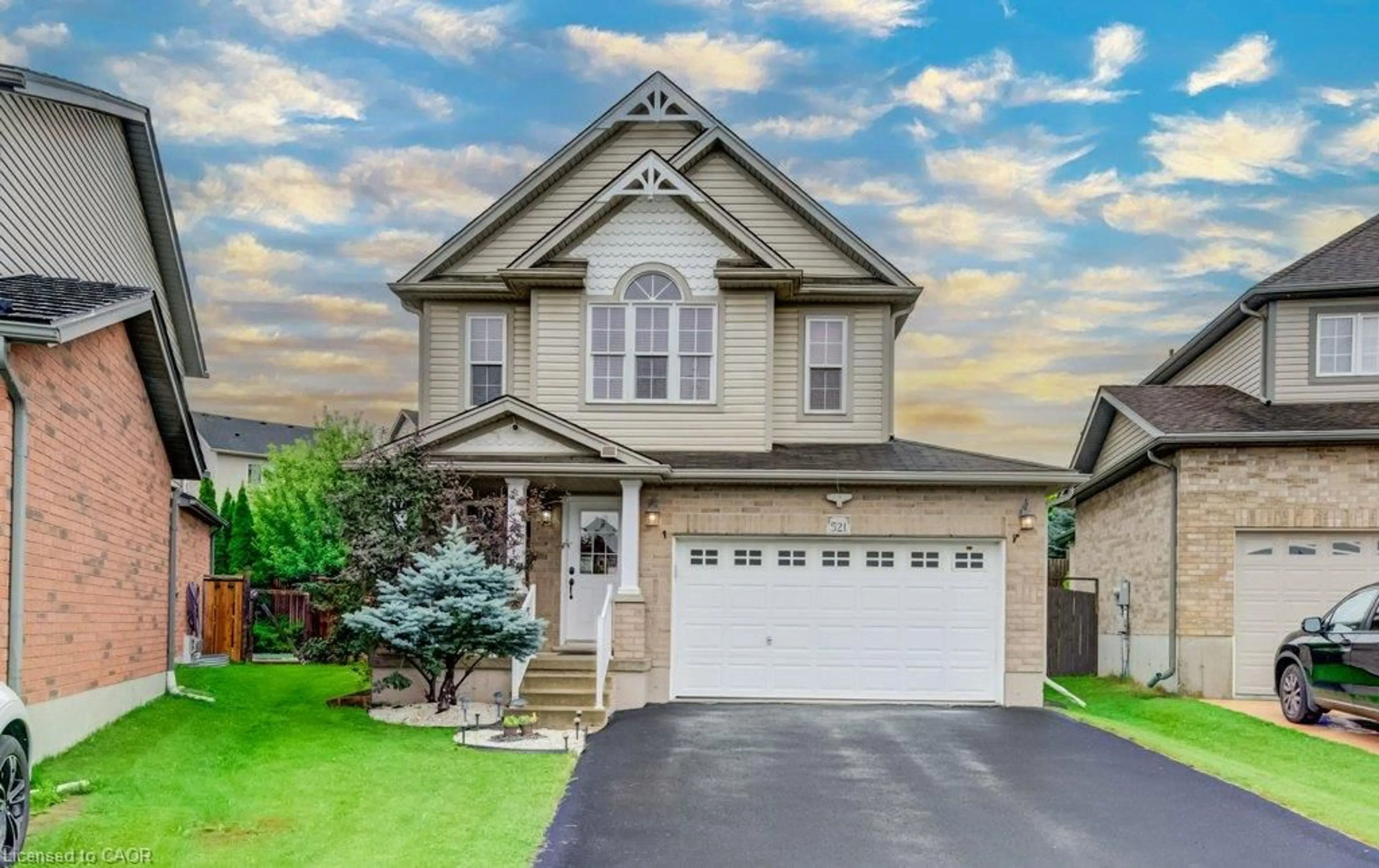 Home with vinyl exterior material, street for 521 Snowdrop Crt, Kitchener Ontario N2E 4G4