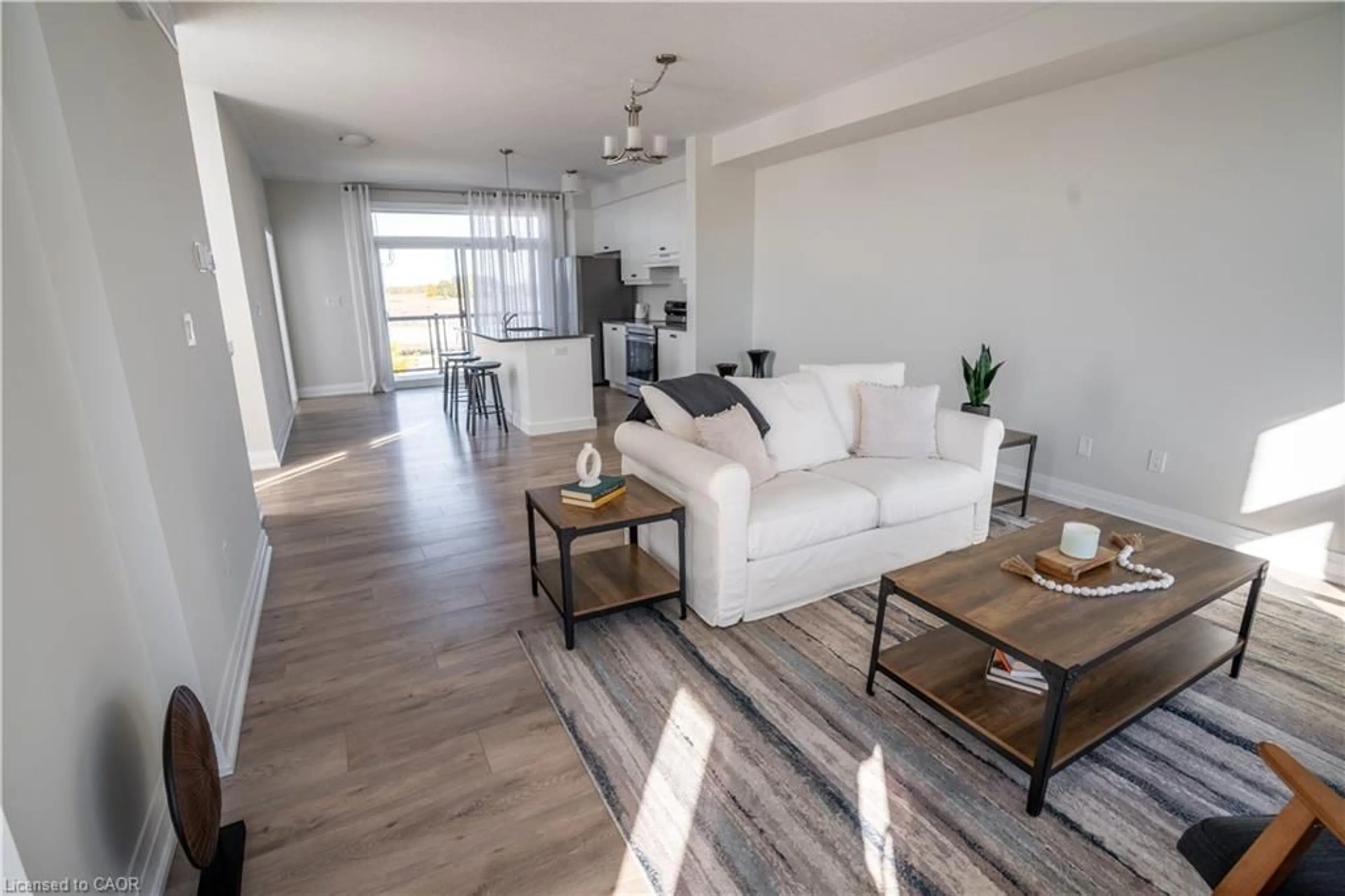 Living room with furniture, unknown for 271 Grey Silo Rd #52, Waterloo Ontario N2K 0E9