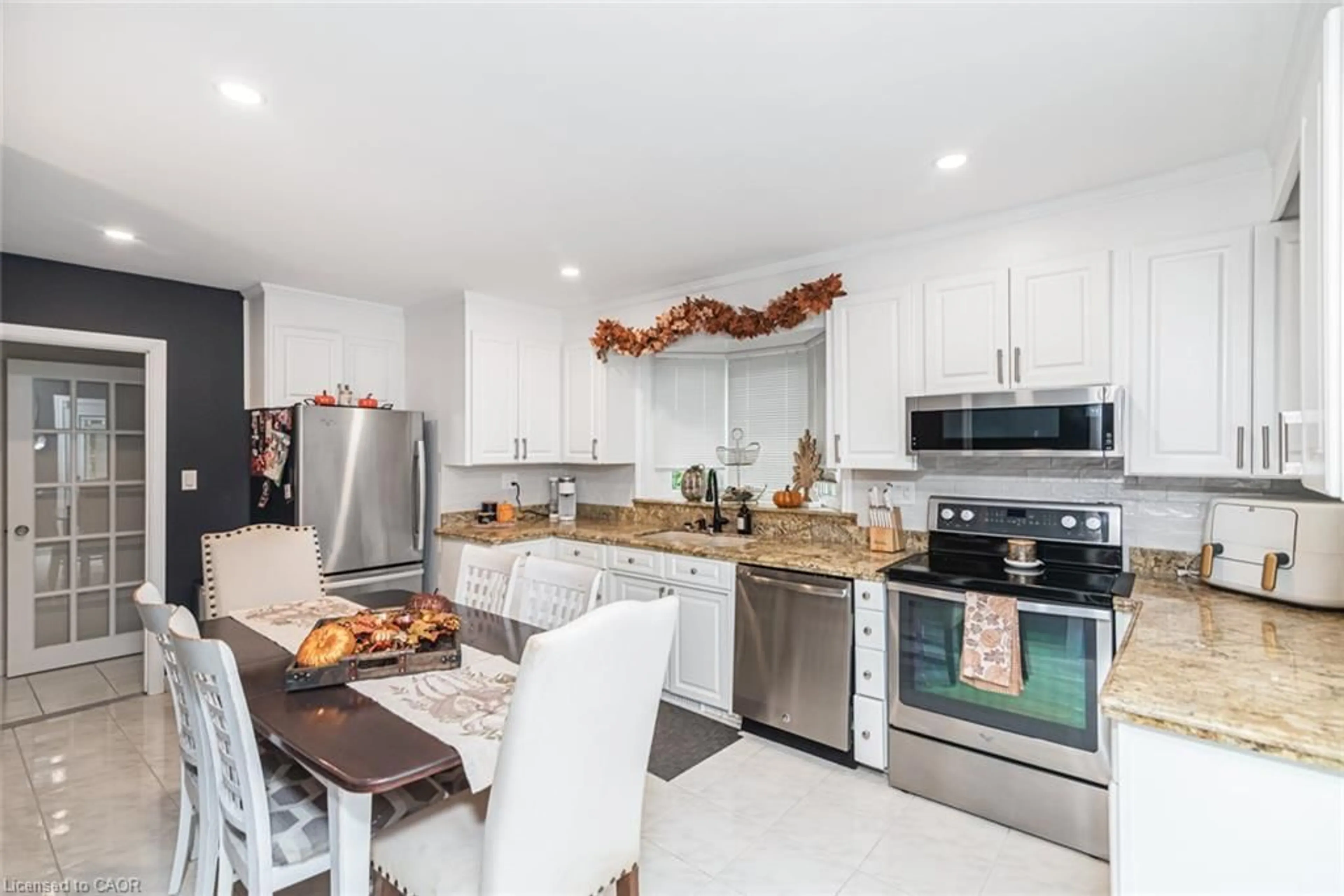 Open concept kitchen, ceramic/tile floor for 43 Alderney Ave, Hamilton Ontario L9A 2A6