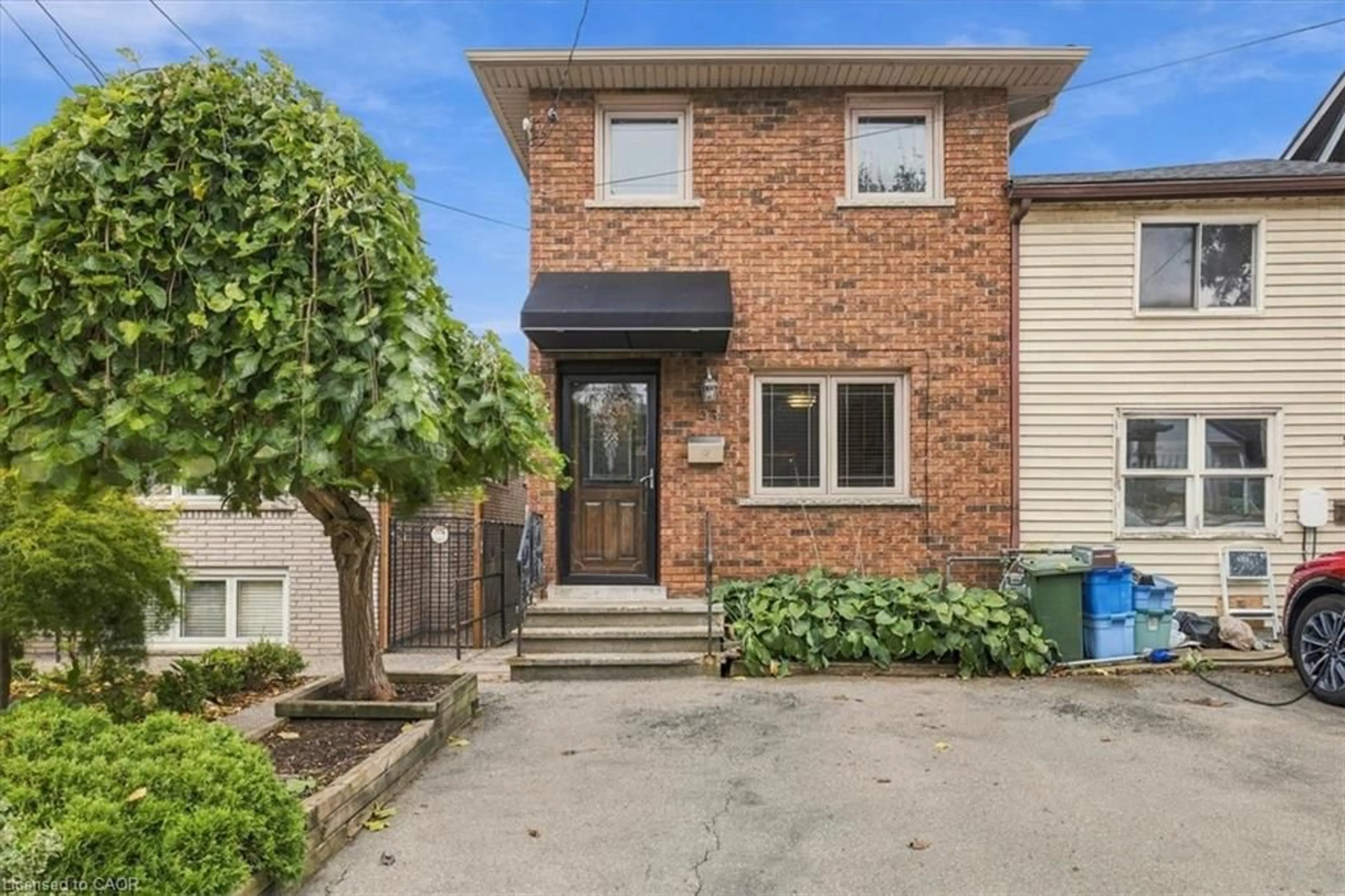Home with brick exterior material, street for 53 Picton St, Hamilton Ontario L8L 1E4