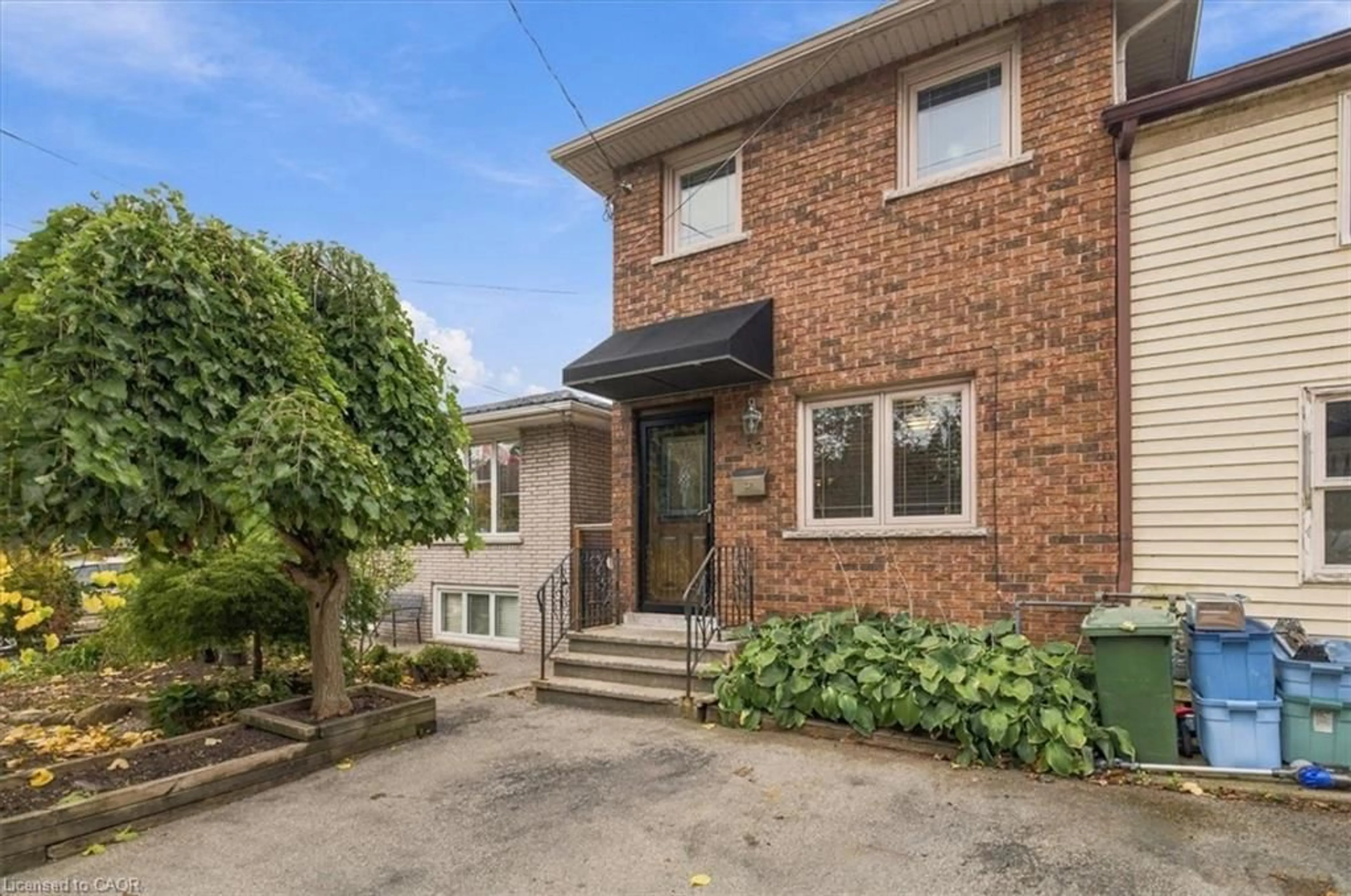 Home with brick exterior material, street for 53 Picton St, Hamilton Ontario L8L 1E4