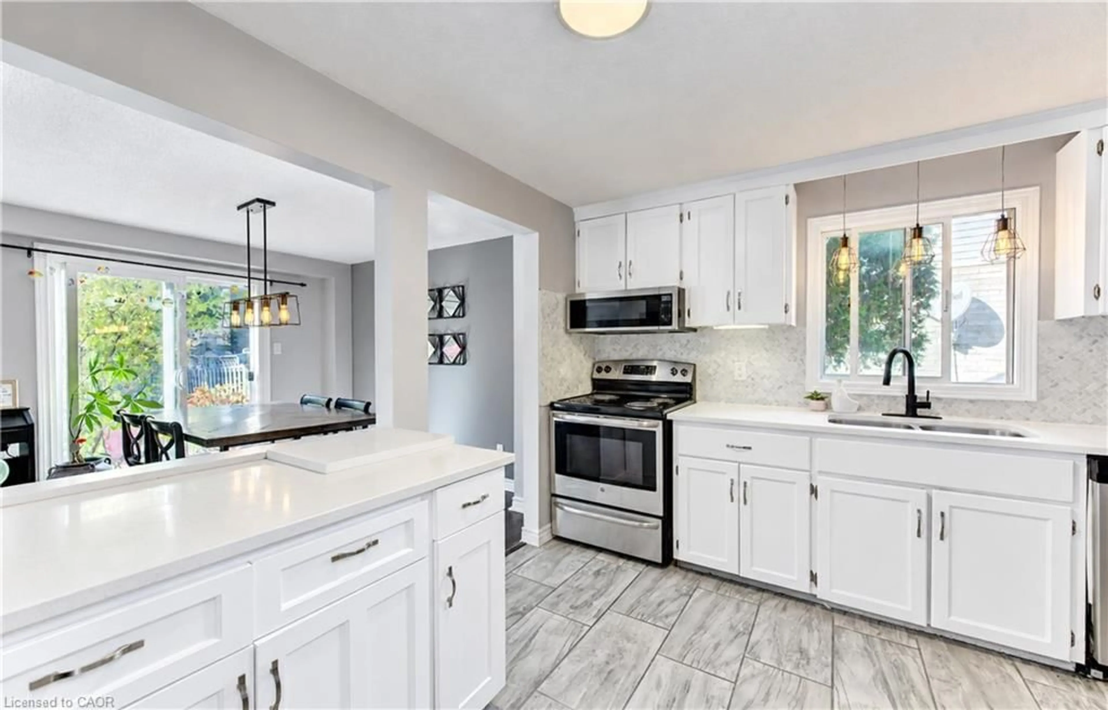 Open concept kitchen, ceramic/tile floor for 527B Rosemeadow Cres, Waterloo Ontario N2T 1Z9