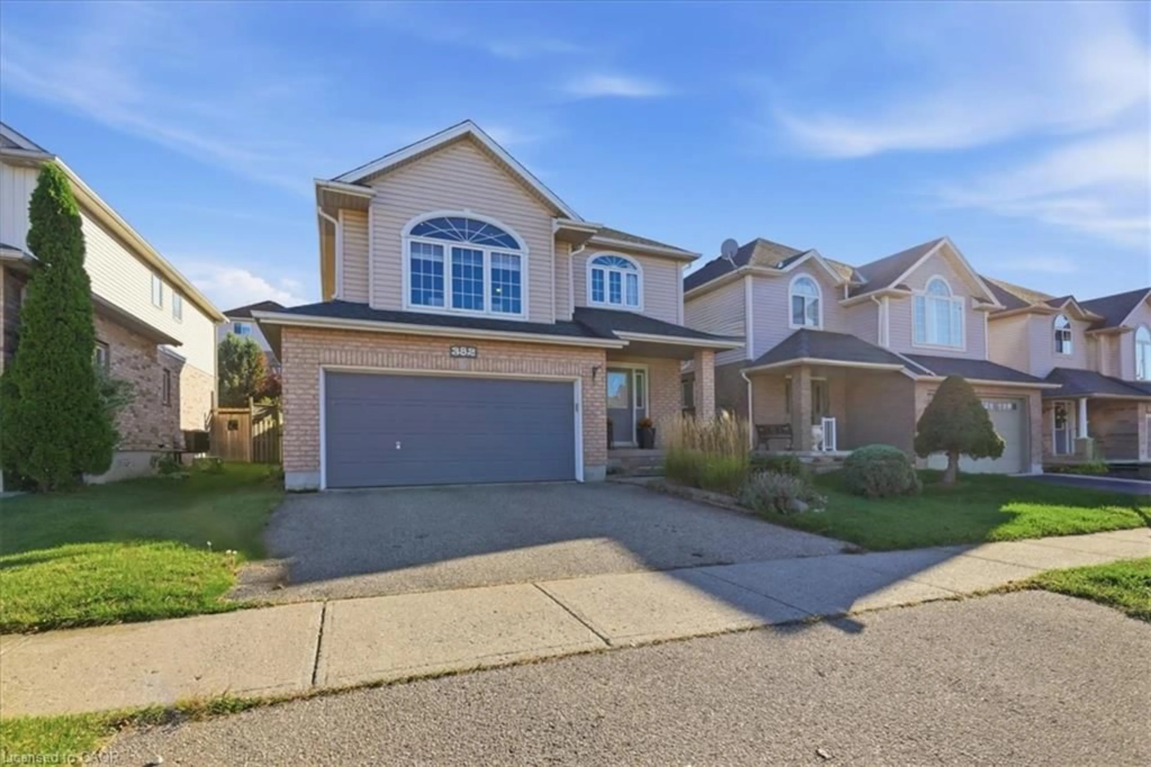 Home with vinyl exterior material, street for 382 Mountain Laurel Cres, Kitchener Ontario N2E 4B4