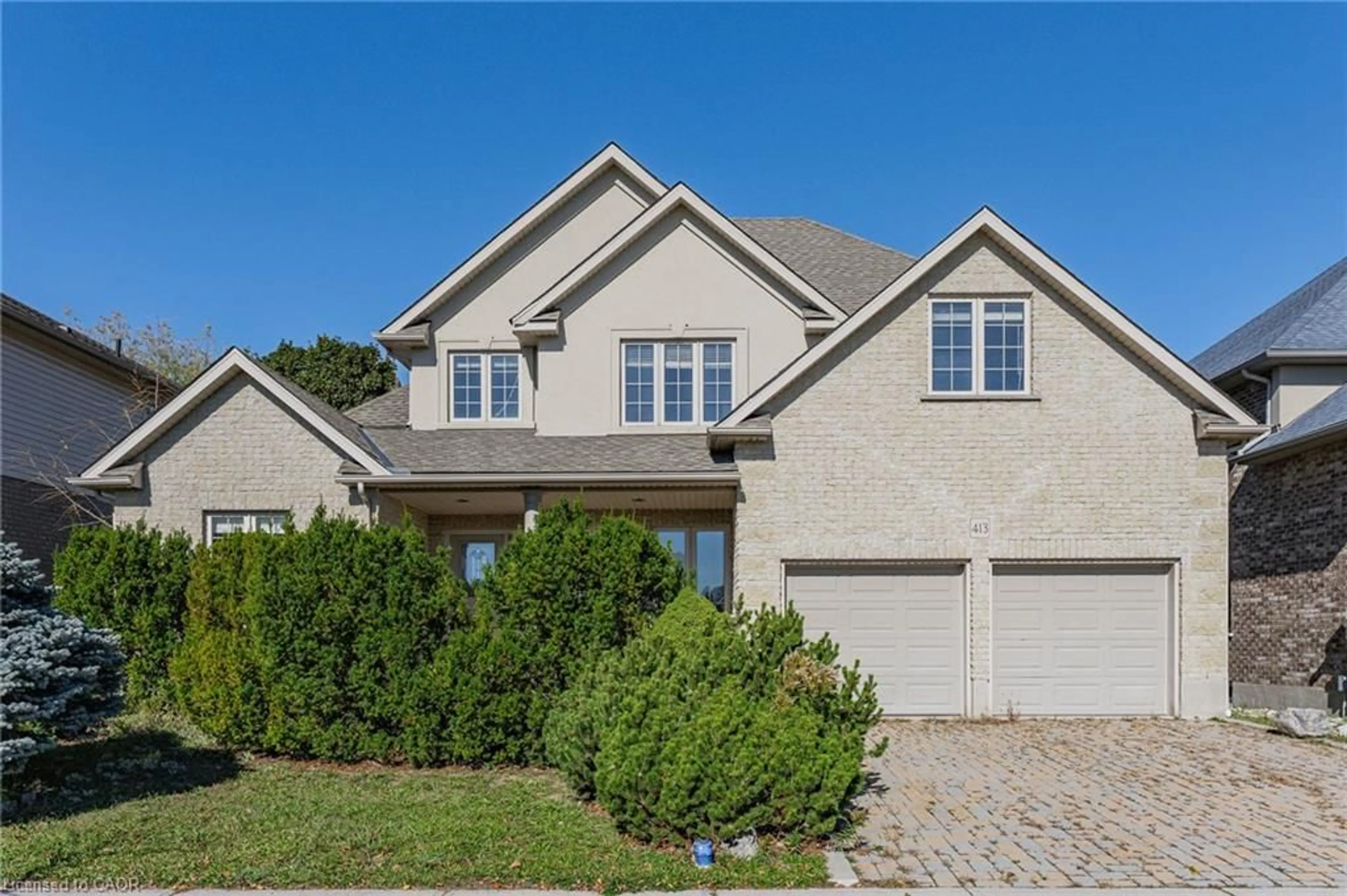 Home with brick exterior material, street for 413 Falconridge Dr, Kitchener Ontario N2K 4H9