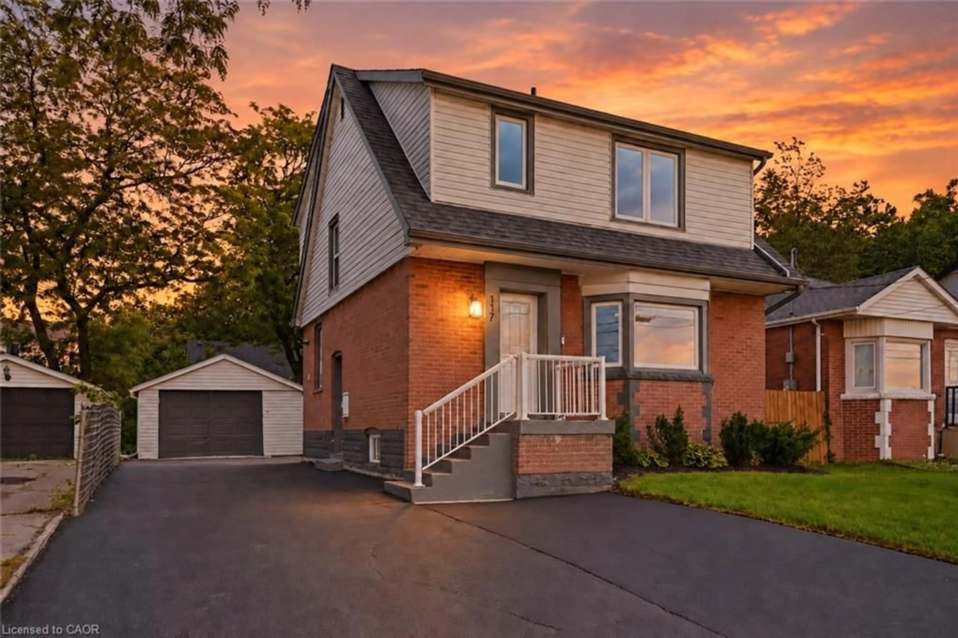 Home with brick exterior material, street for 117 West 5th St, Hamilton Ontario L9C 3N7