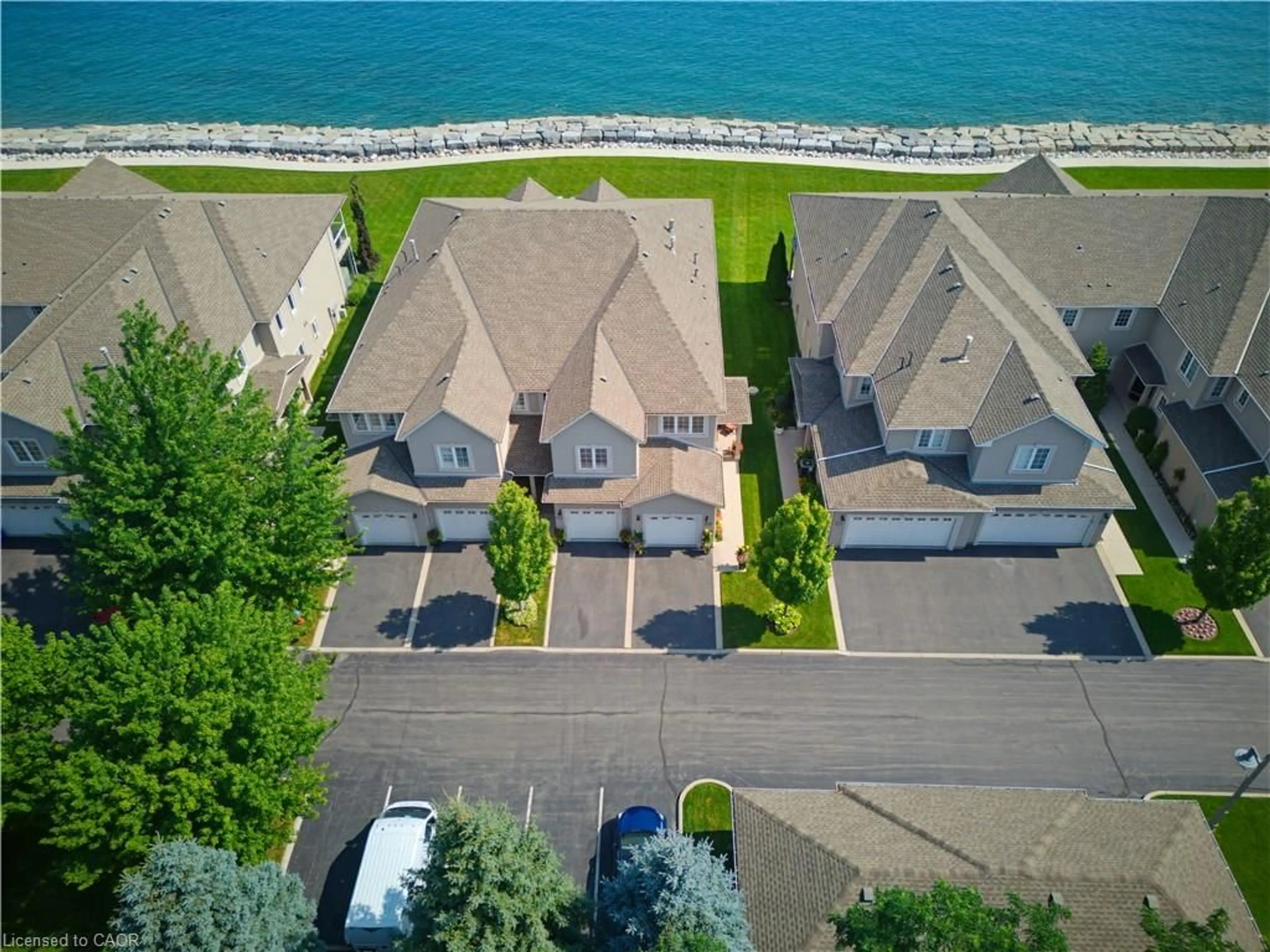 A pic from outside/outdoor area/front of a property/back of a property/a pic from drone, water/lake/river/ocean view for 484 Millen Rd #15, Stoney Creek Ontario L8E 6G4