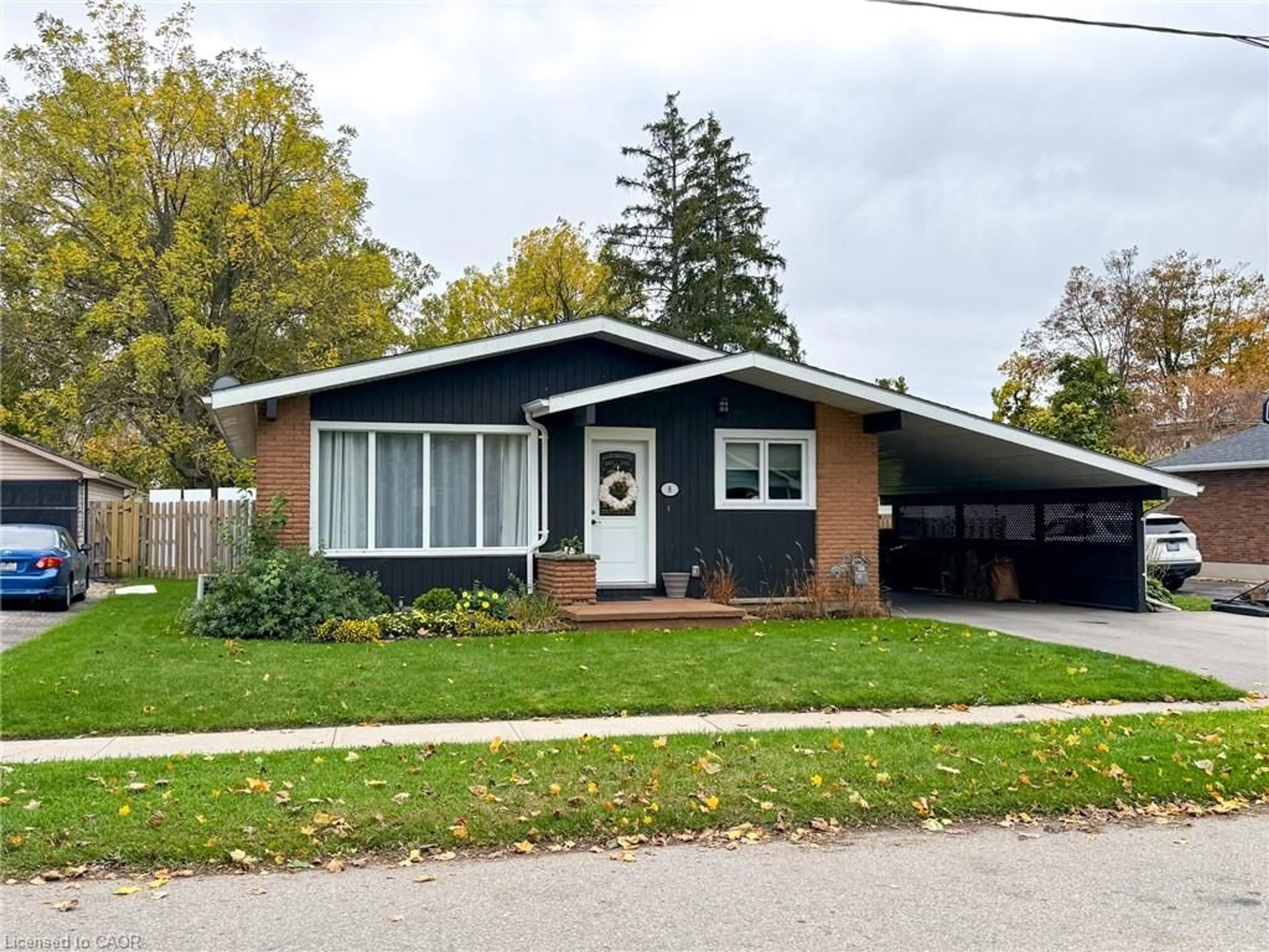Home with vinyl exterior material, street for 8 Rutherford St, Burford Ontario N0E 1A0