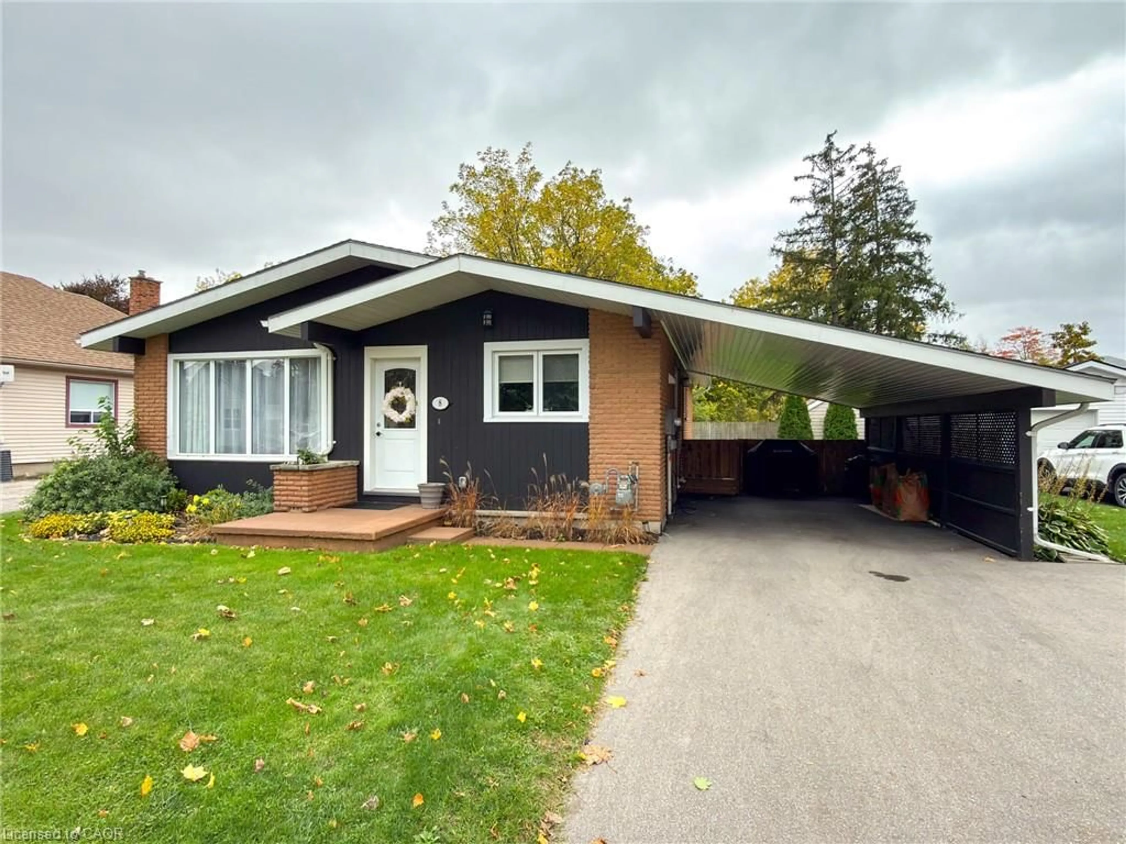 Home with brick exterior material, street for 8 Rutherford St, Burford Ontario N0E 1A0