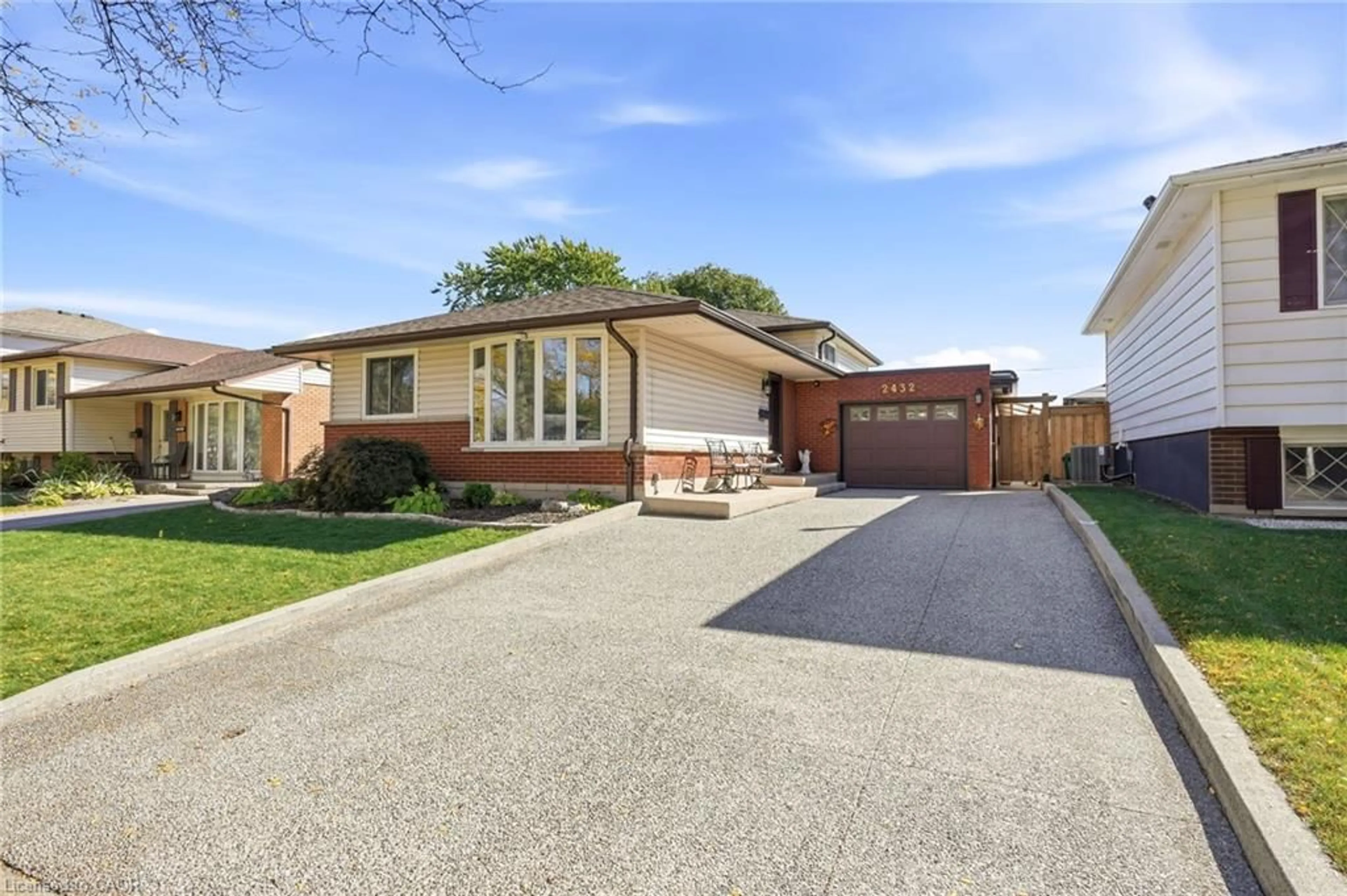 Home with brick exterior material, street for 2432 Cyprus Ave, Burlington Ontario L7P 1G6