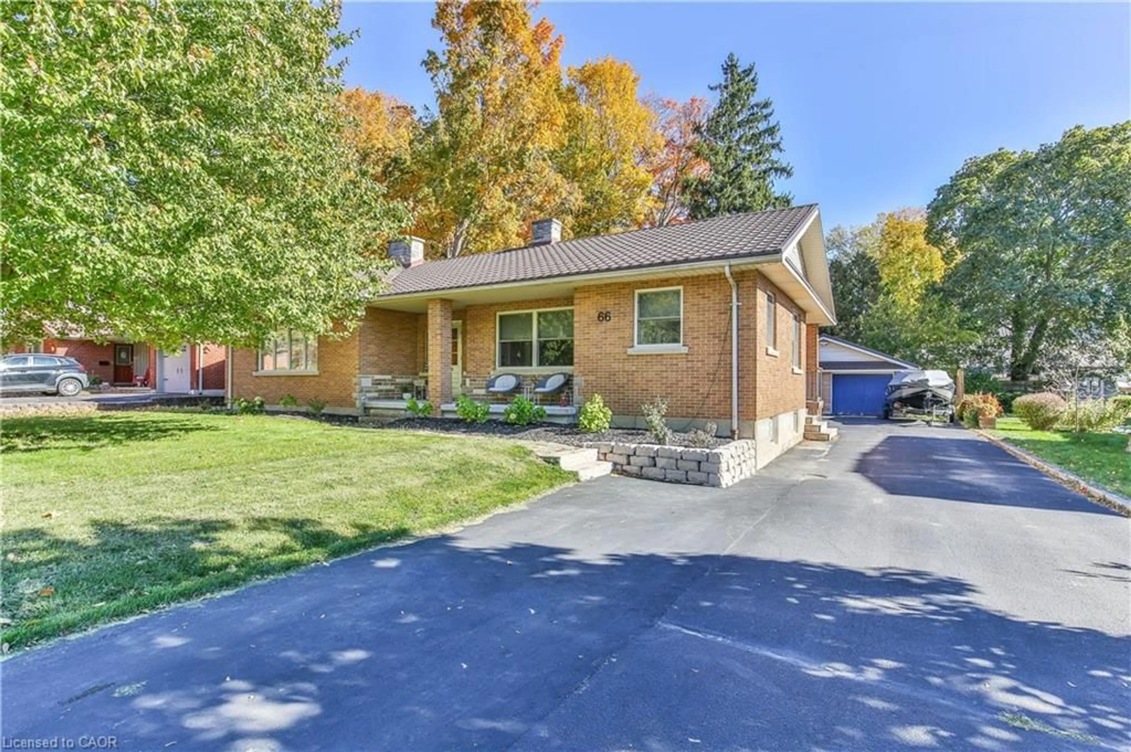 Home with brick exterior material, street for 66 Lisgar Ave, Tillsonburg Ontario N4G 3K9