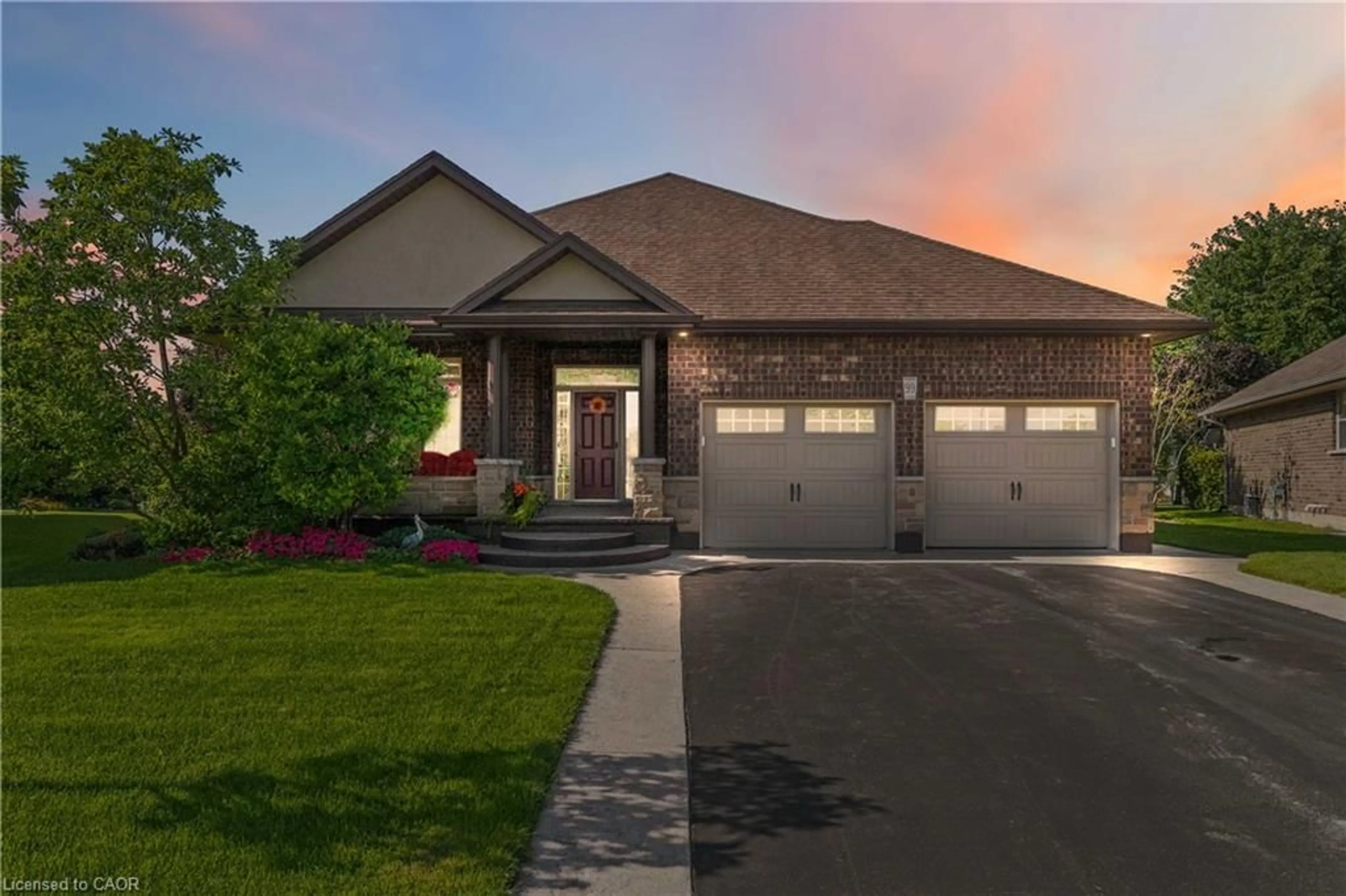 Home with brick exterior material, street for 99 Magnolia Dr, Port Dover Ontario N0A 1N6