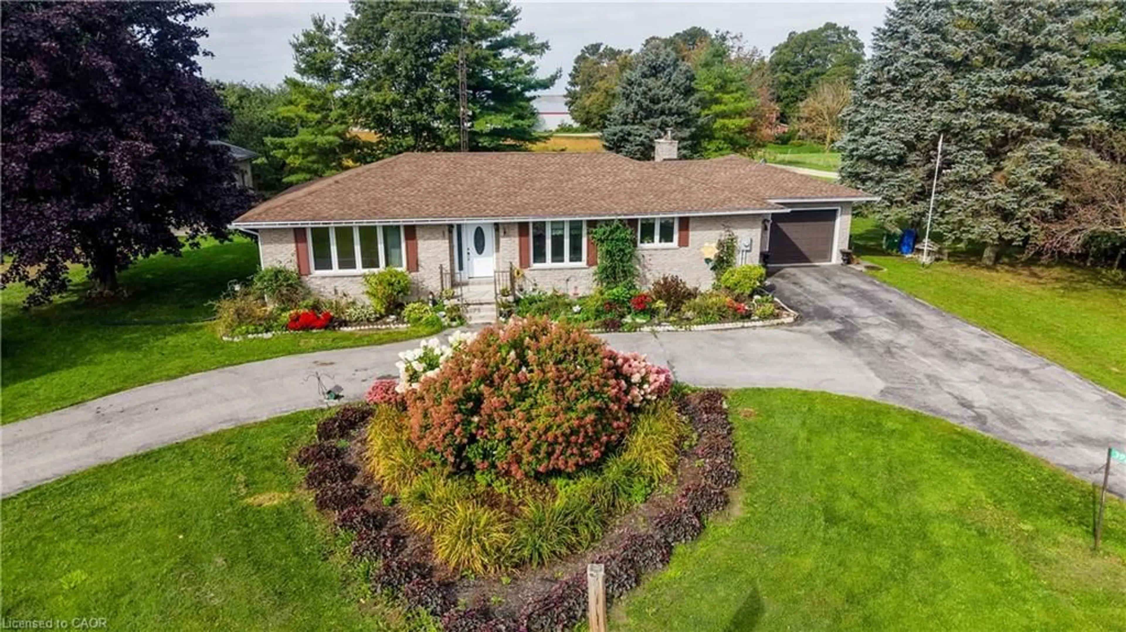 A pic from outside/outdoor area/front of a property/back of a property/a pic from drone, street for 392172 Grey Rd 109, Holstein Ontario N0G 2A0