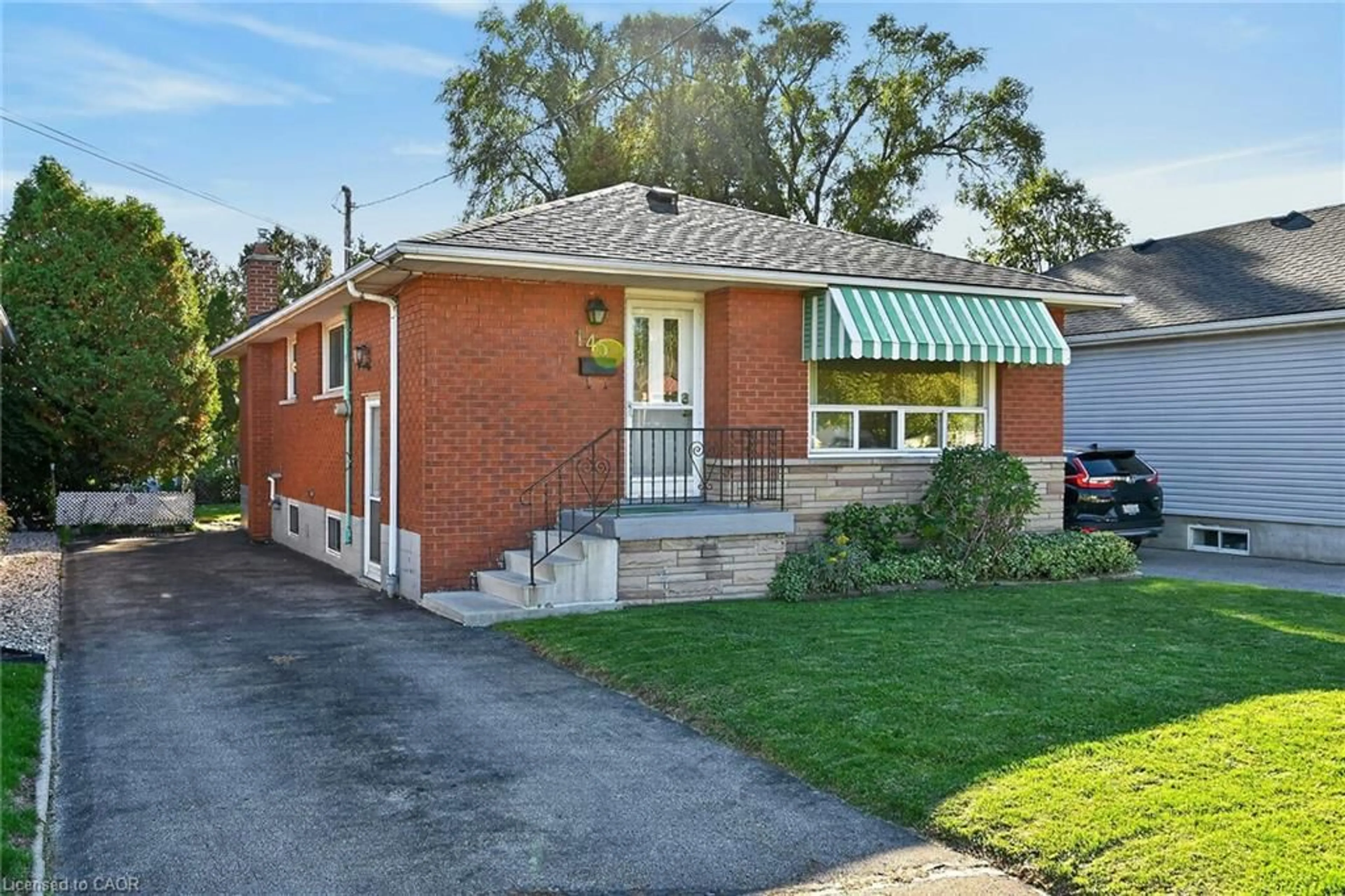 Home with brick exterior material, street for 145 East 25th St, Hamilton Ontario L8V 3A3