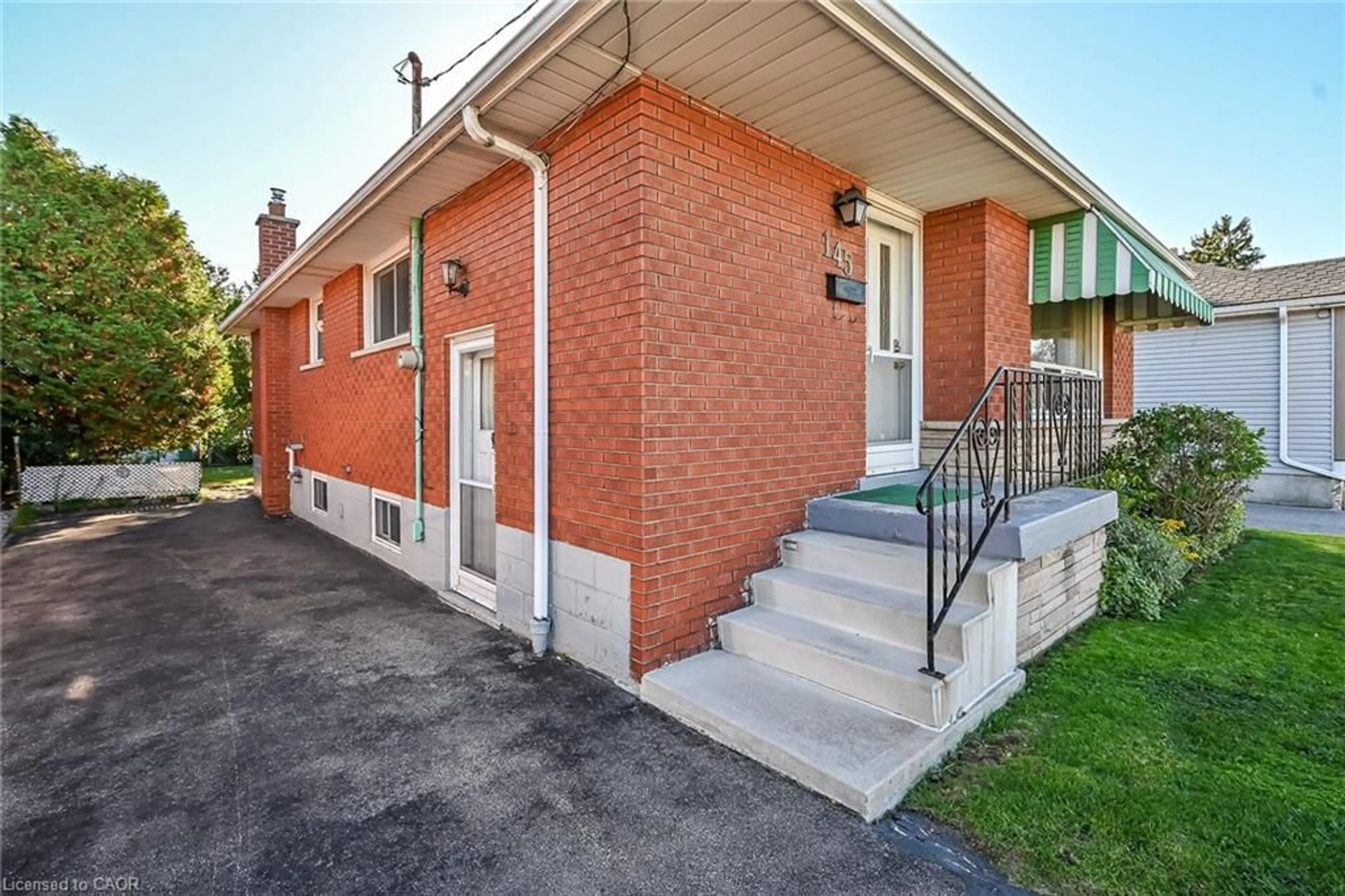 Home with brick exterior material, street for 145 East 25th St, Hamilton Ontario L8V 3A3