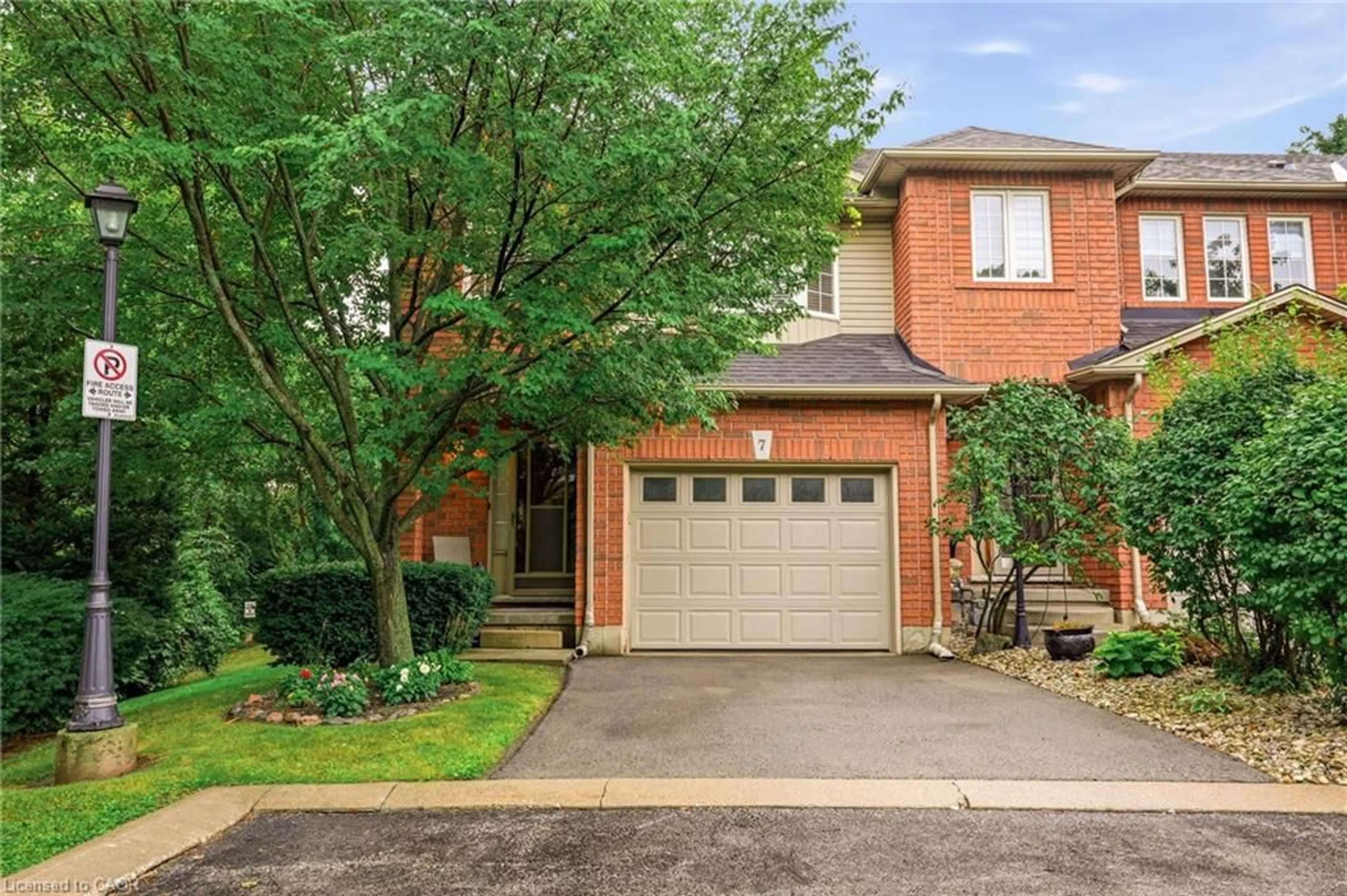 Home with brick exterior material, street for 348 Highland Rd #7, Stoney Creek Ontario L8J 3W5
