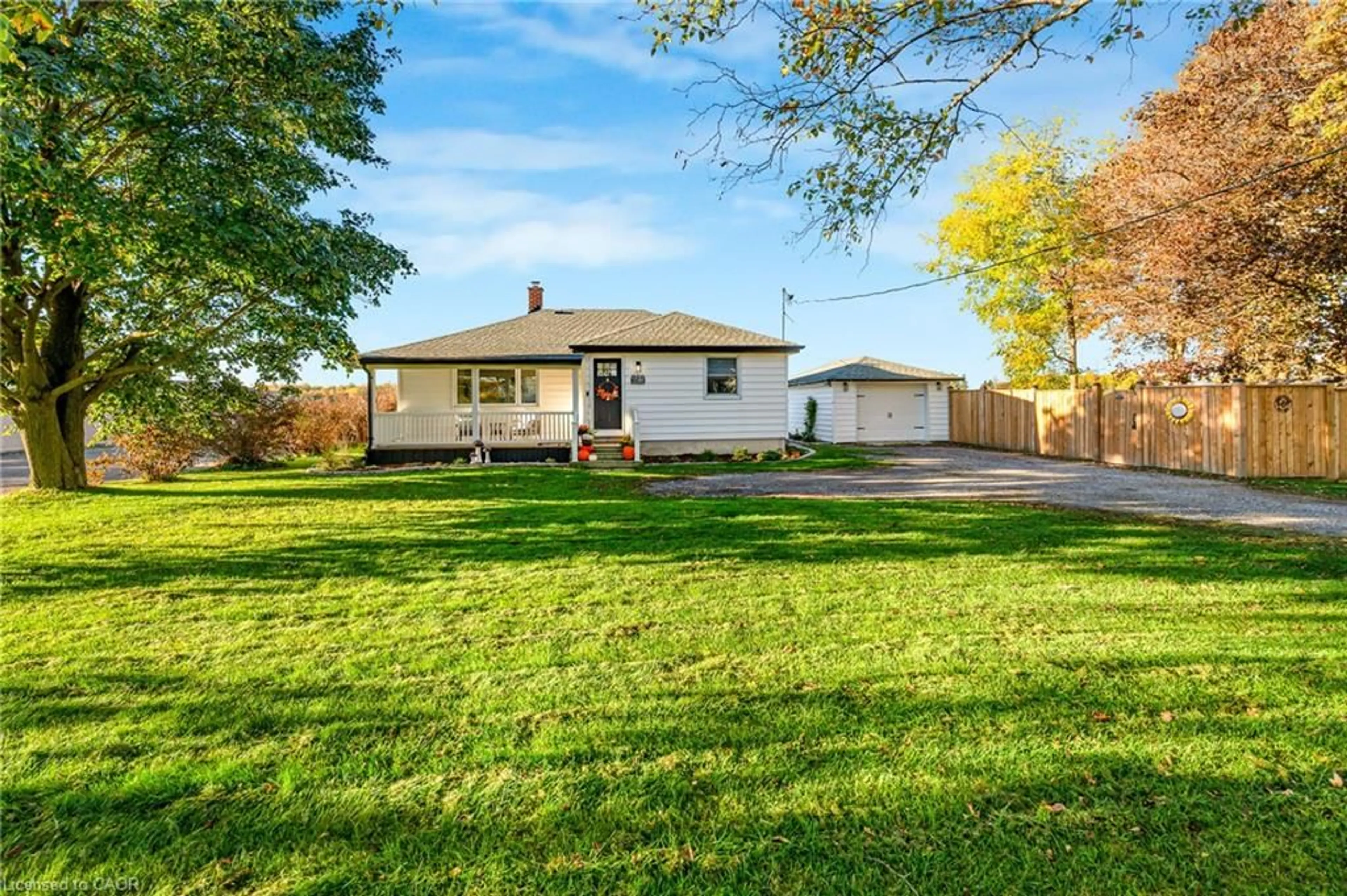 A pic from outside/outdoor area/front of a property/back of a property/a pic from drone, street for 33305 Richmond St, Lucan Ontario N0M 2J0