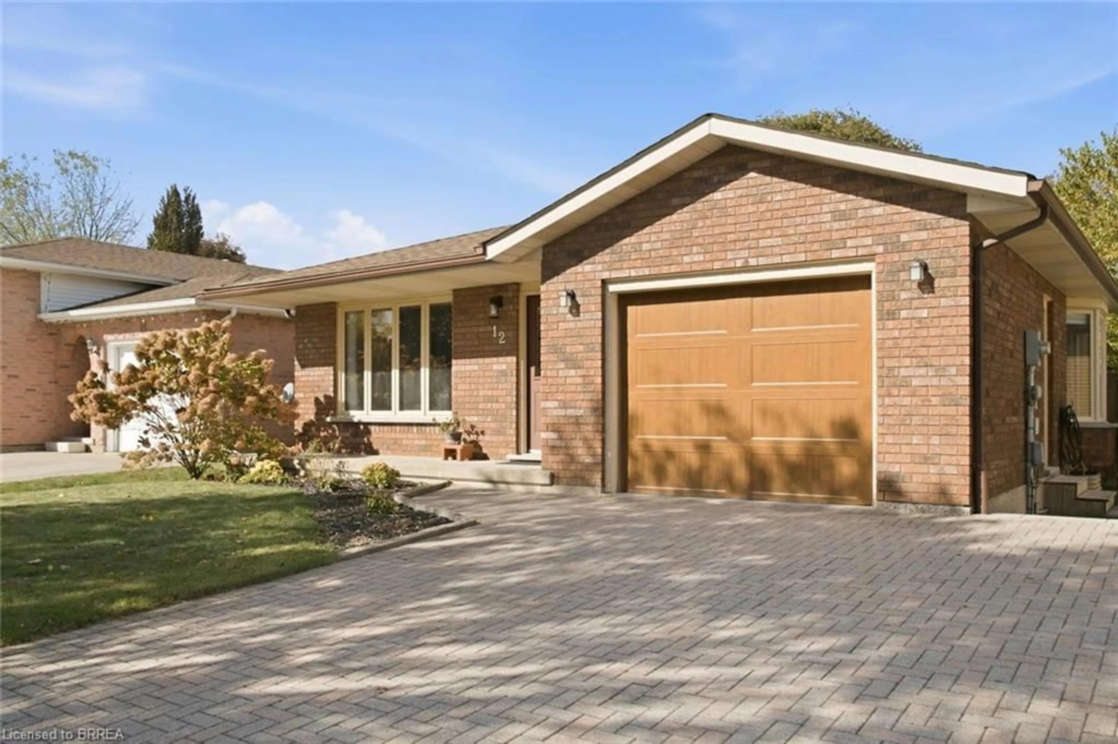 Home with brick exterior material, street for 12 Spartan Dr, Brantford Ontario N3R 6C7
