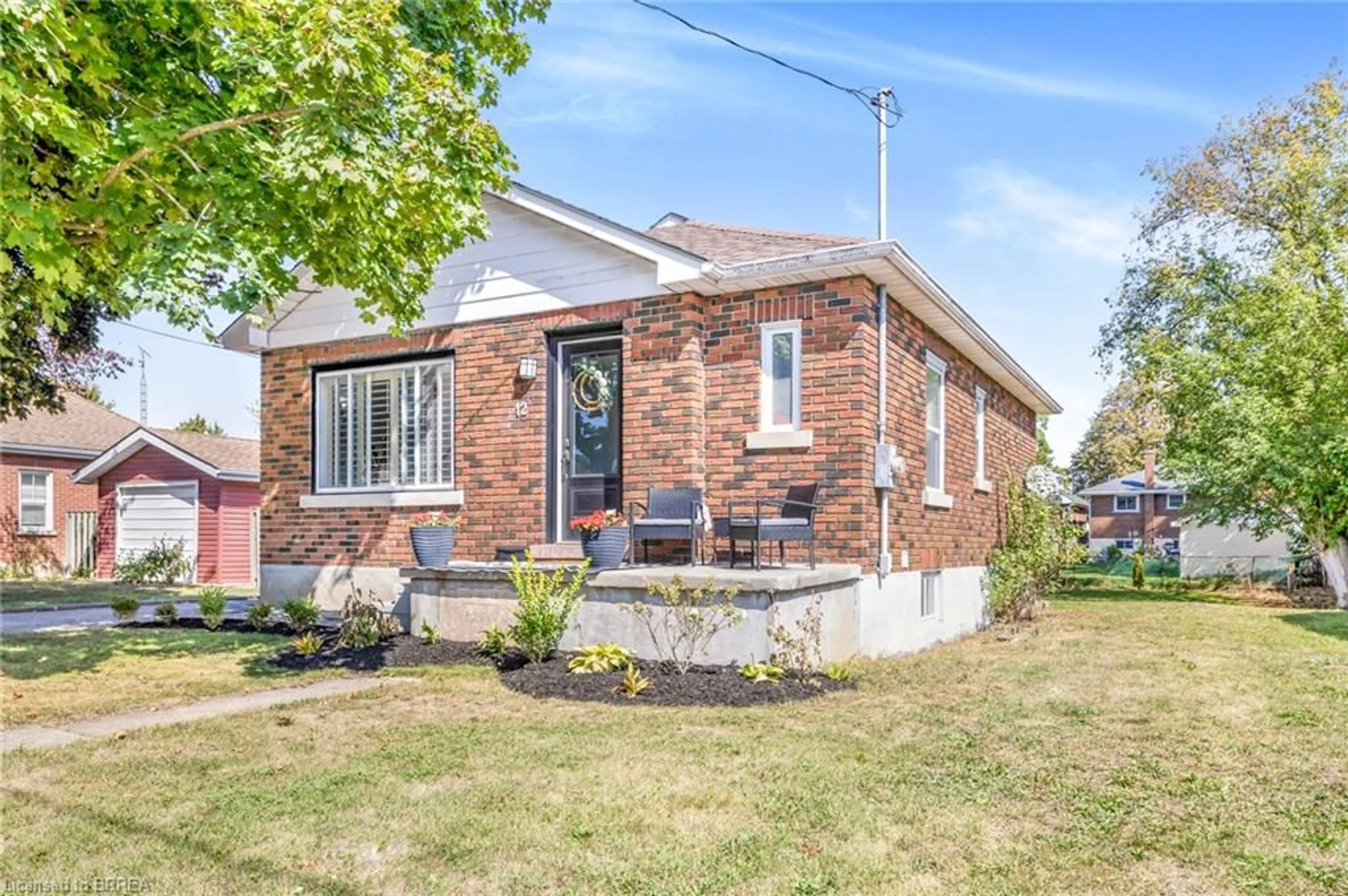 Home with brick exterior material, street for 12 Patricia St, Brantford Ontario N3T 1W5