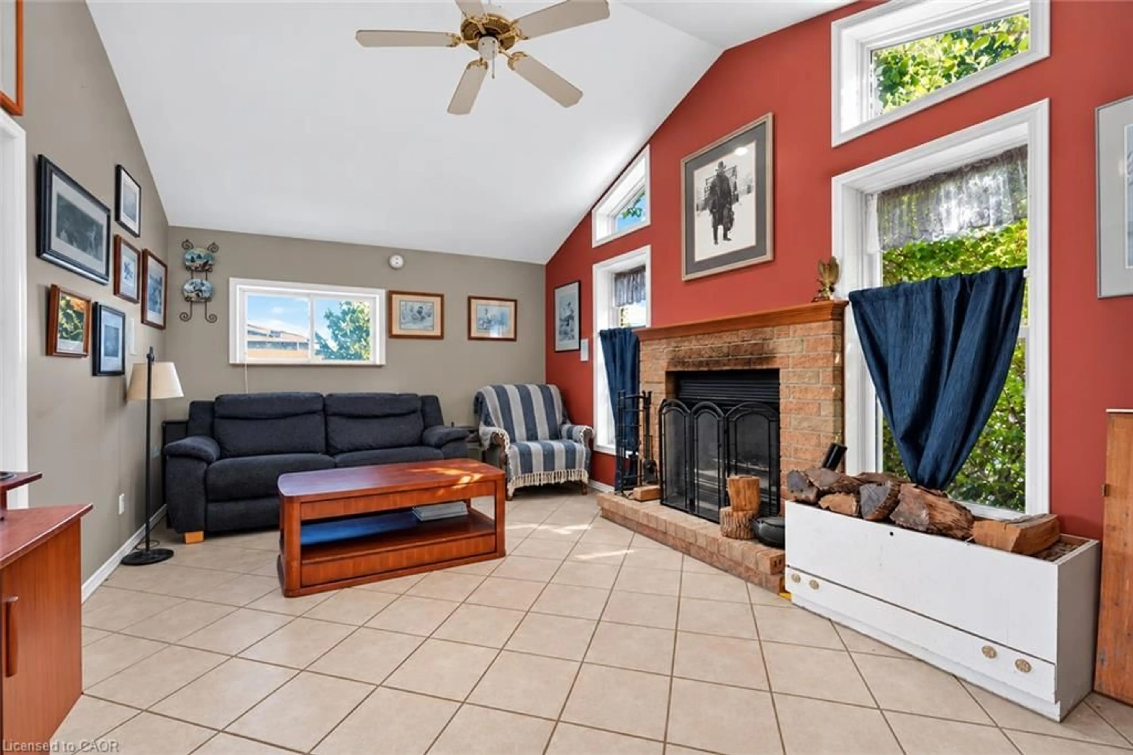 Living room with furniture, ceramic/tile floor for 4418 Tufford Rd, Beamsville Ontario L3J 1L6