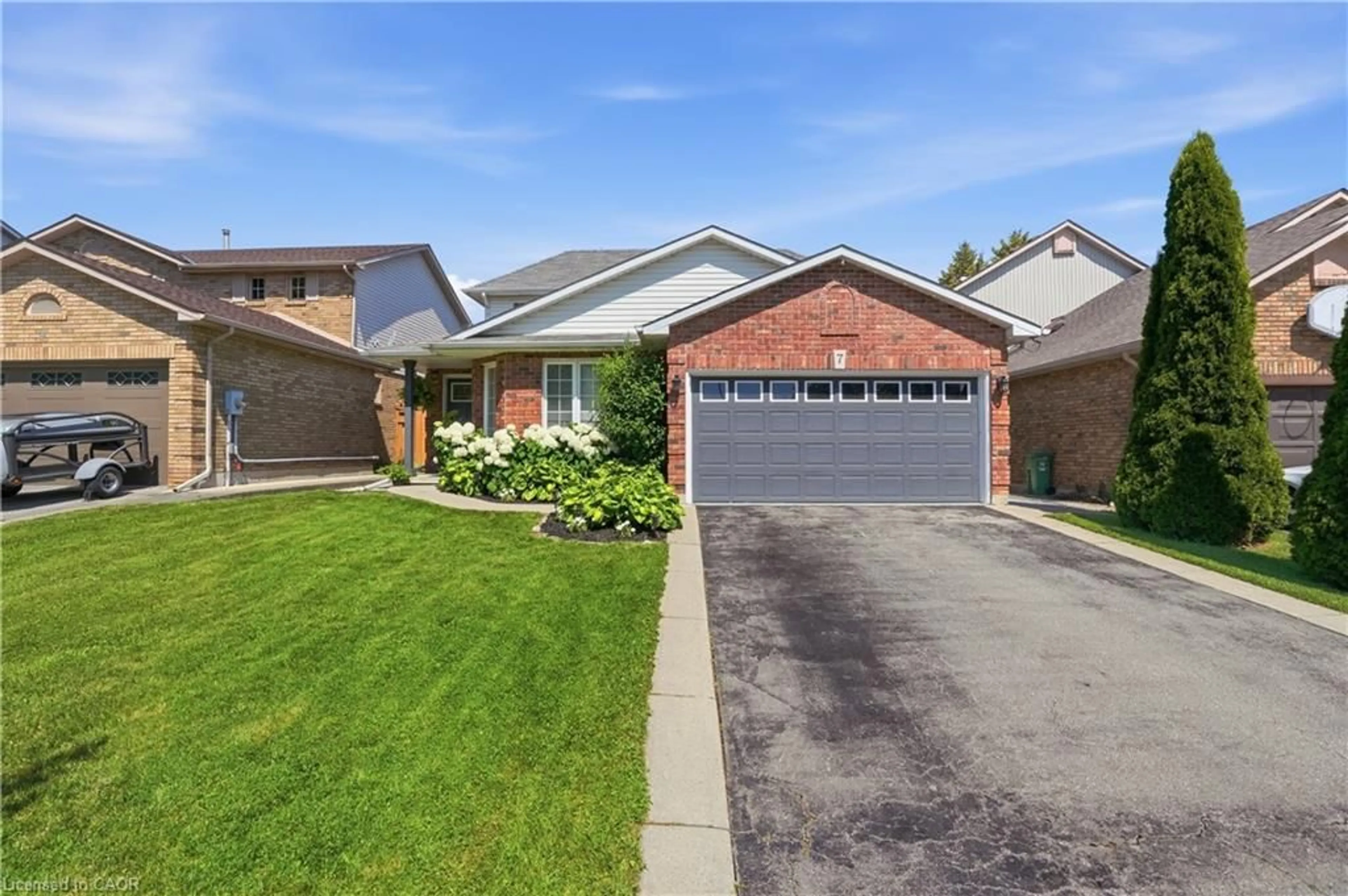 Home with brick exterior material, street for 7 Rockhaven Lane, Waterdown Ontario L8B 0H7