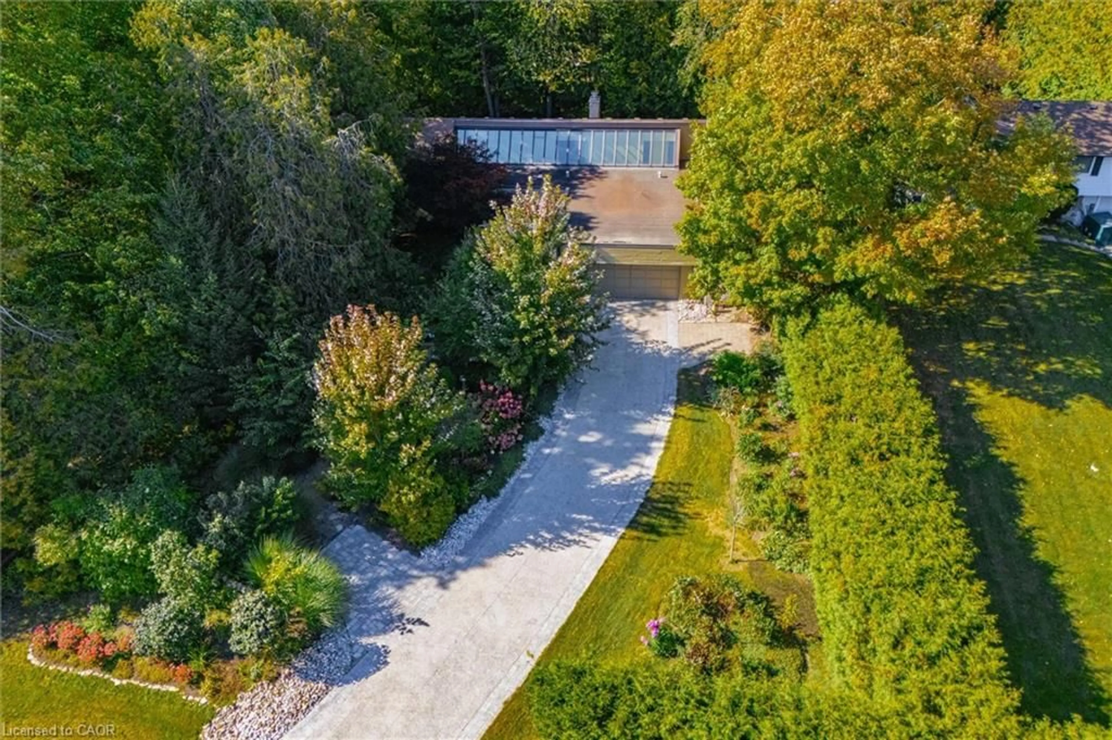 A pic from outside/outdoor area/front of a property/back of a property/a pic from drone, forest/trees view for 168 South River Rd, Elora Ontario N0B 1S0