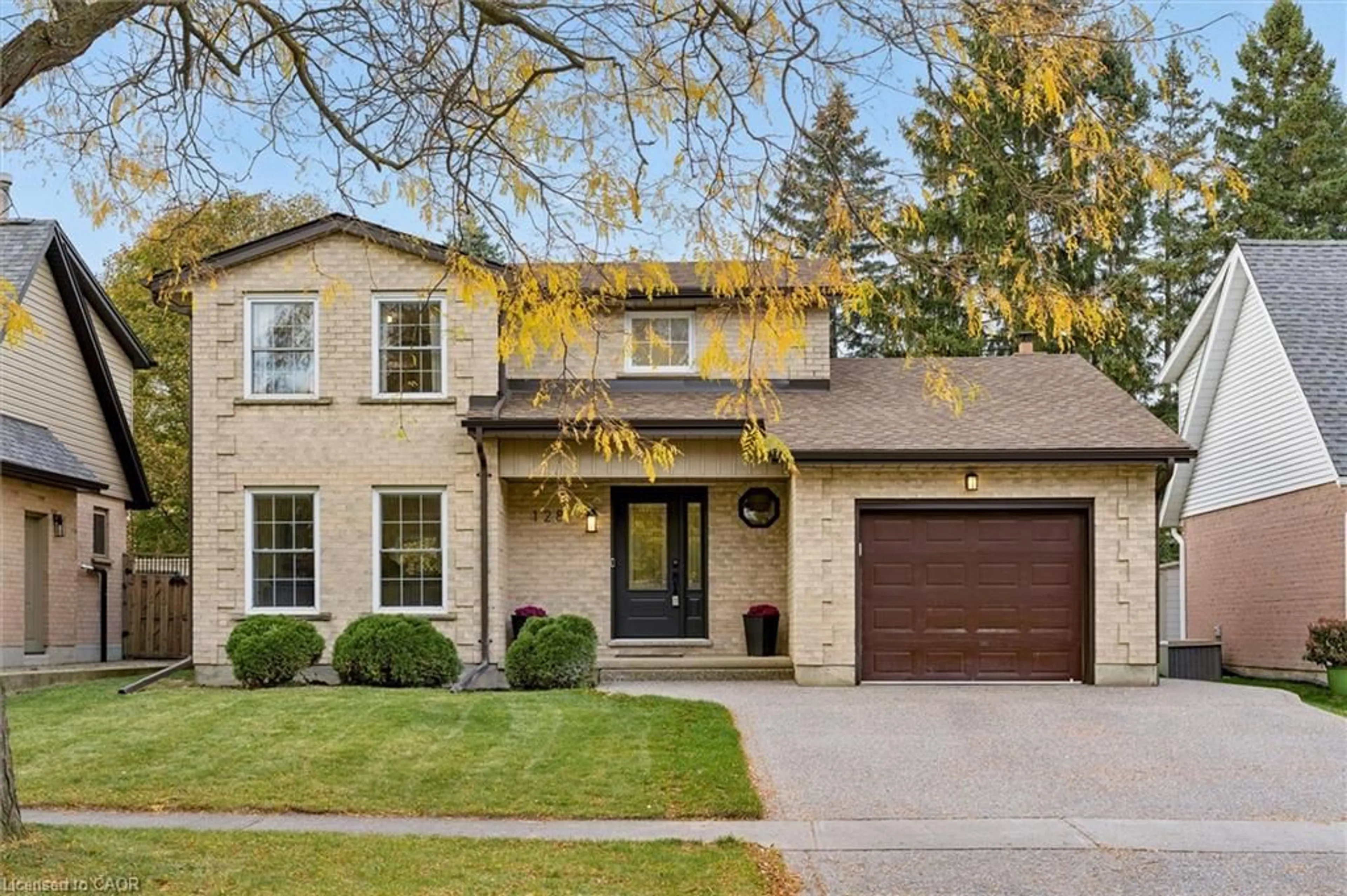 Home with brick exterior material, street for 128 Sunpoint Cres, Waterloo Ontario N2V 1V1
