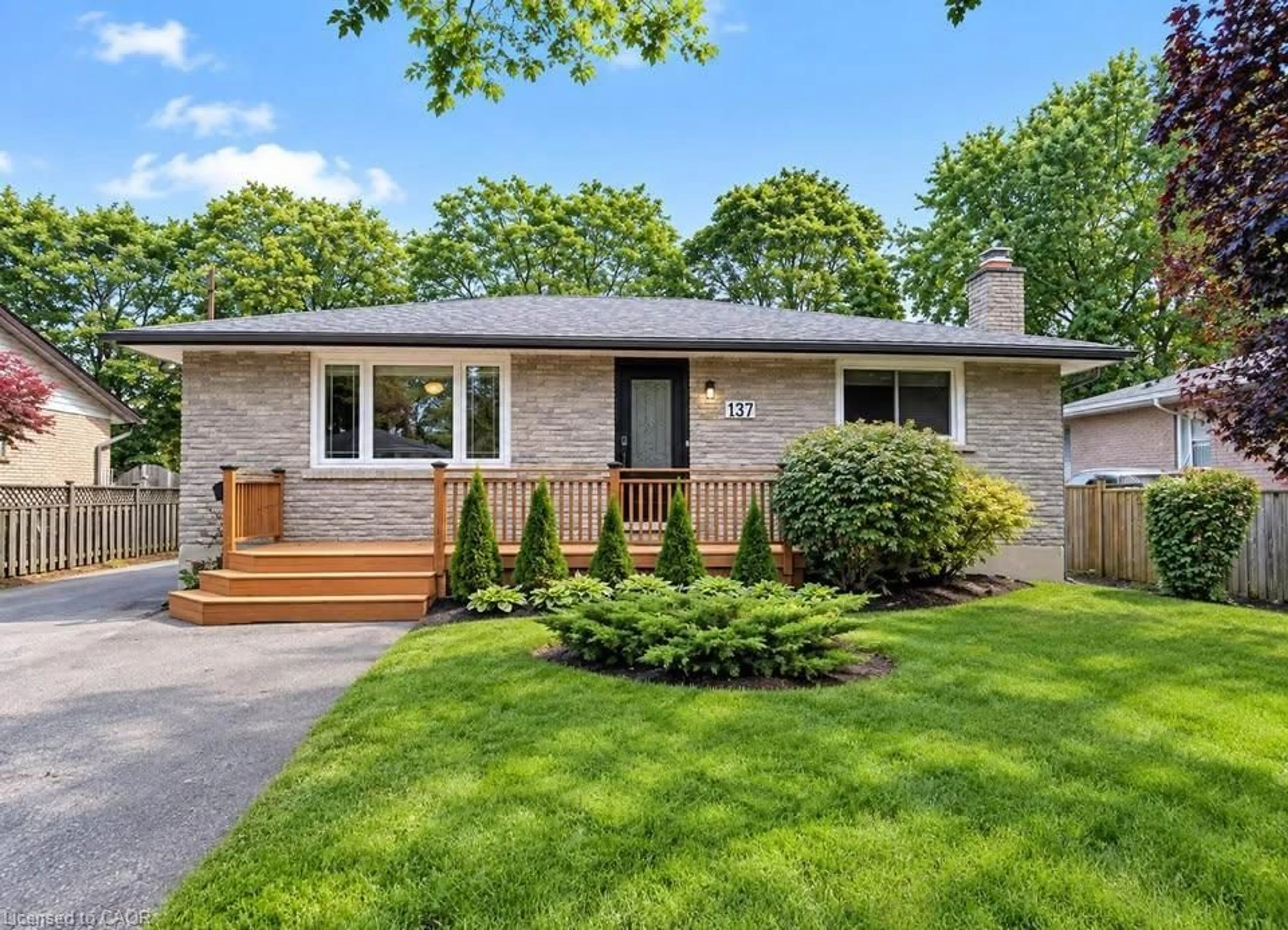 Home with brick exterior material, street for 137 Country Club Dr, Guelph Ontario N1E 3K8