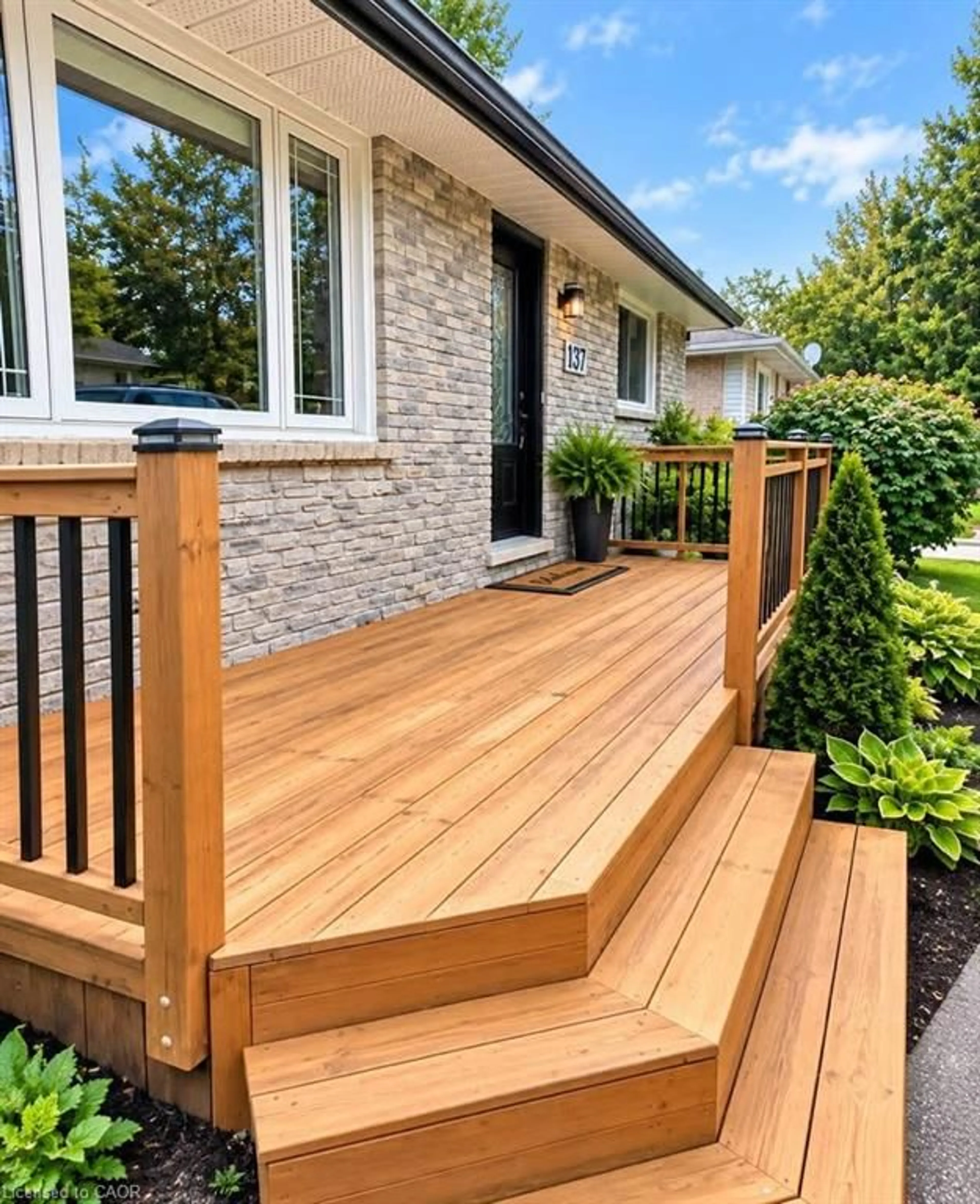 Home with vinyl exterior material, street for 137 Country Club Dr, Guelph Ontario N1E 3K8