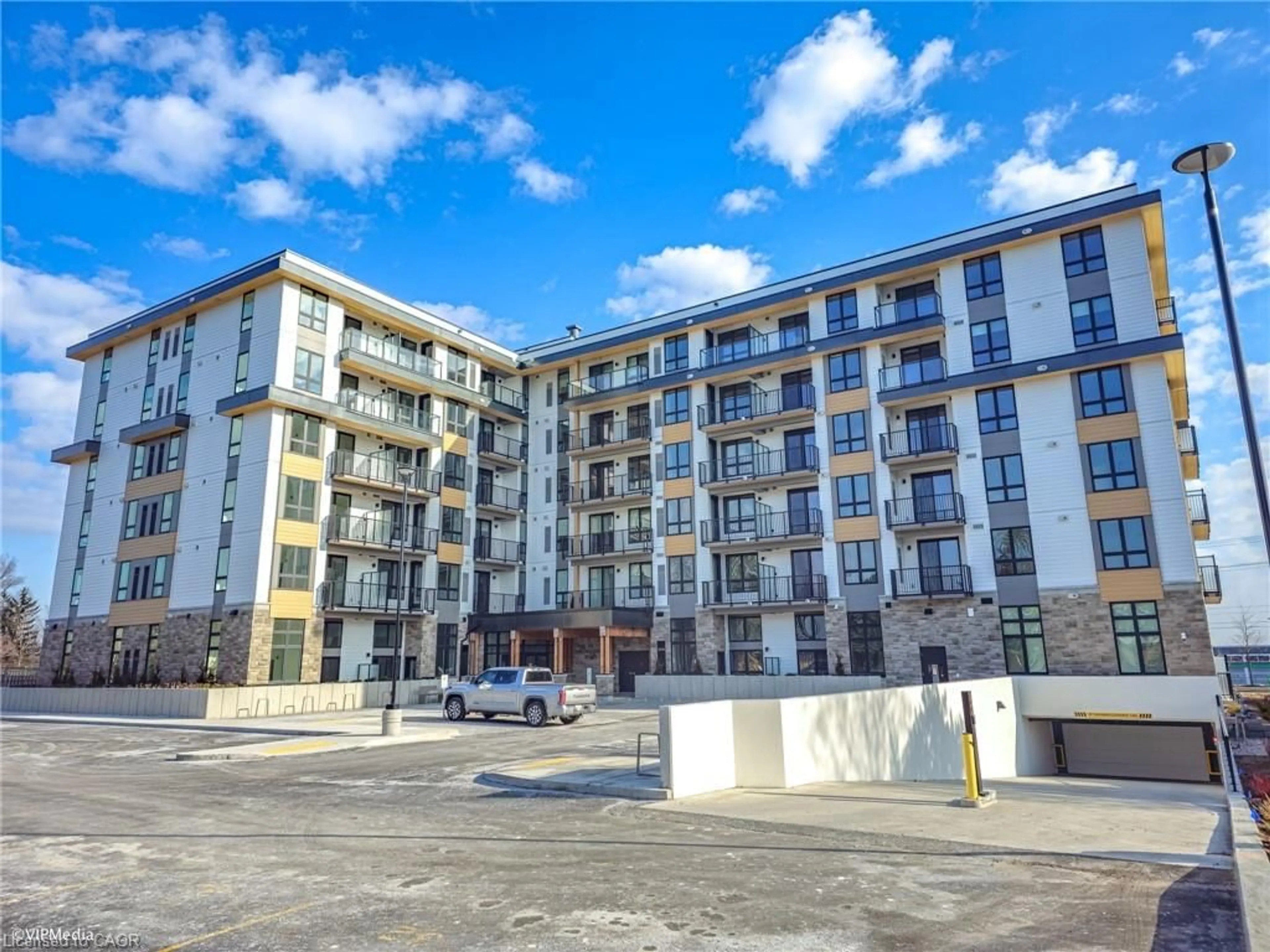 A pic from outside/outdoor area/front of a property/back of a property/a pic from drone, building for 101 Golden Eagle Rd #112, Waterloo Ontario N2V 1C3